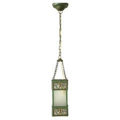 Colgante escandinavo de metal y cristal verde