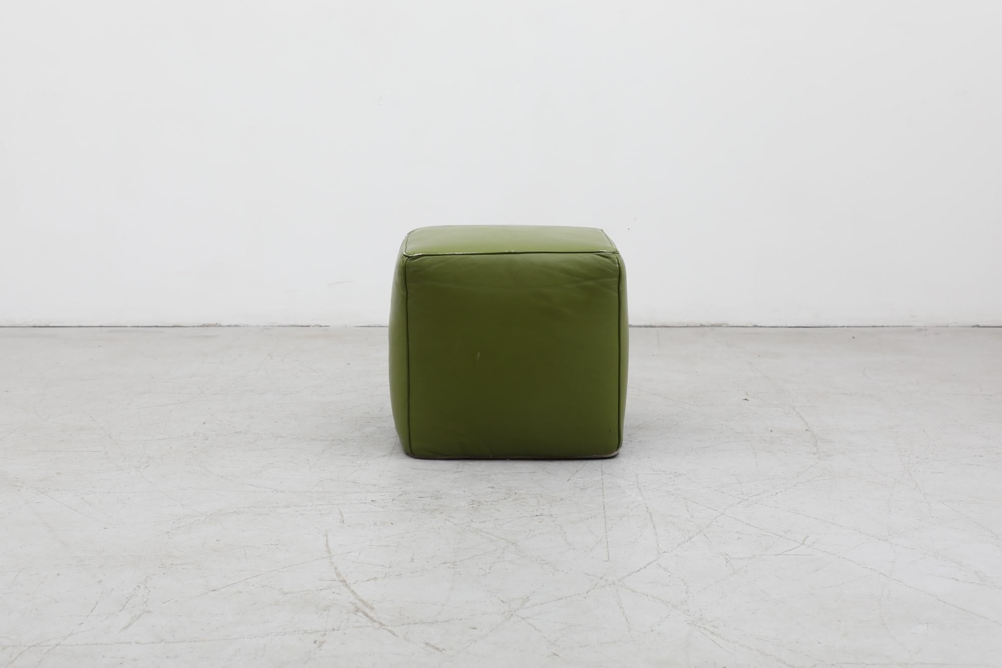 Beautiful Mid-Century green, skai cube ottoman. In original condition with some signs of wear consistent with It's age and use. Other similar ottoman also available and listed separately.