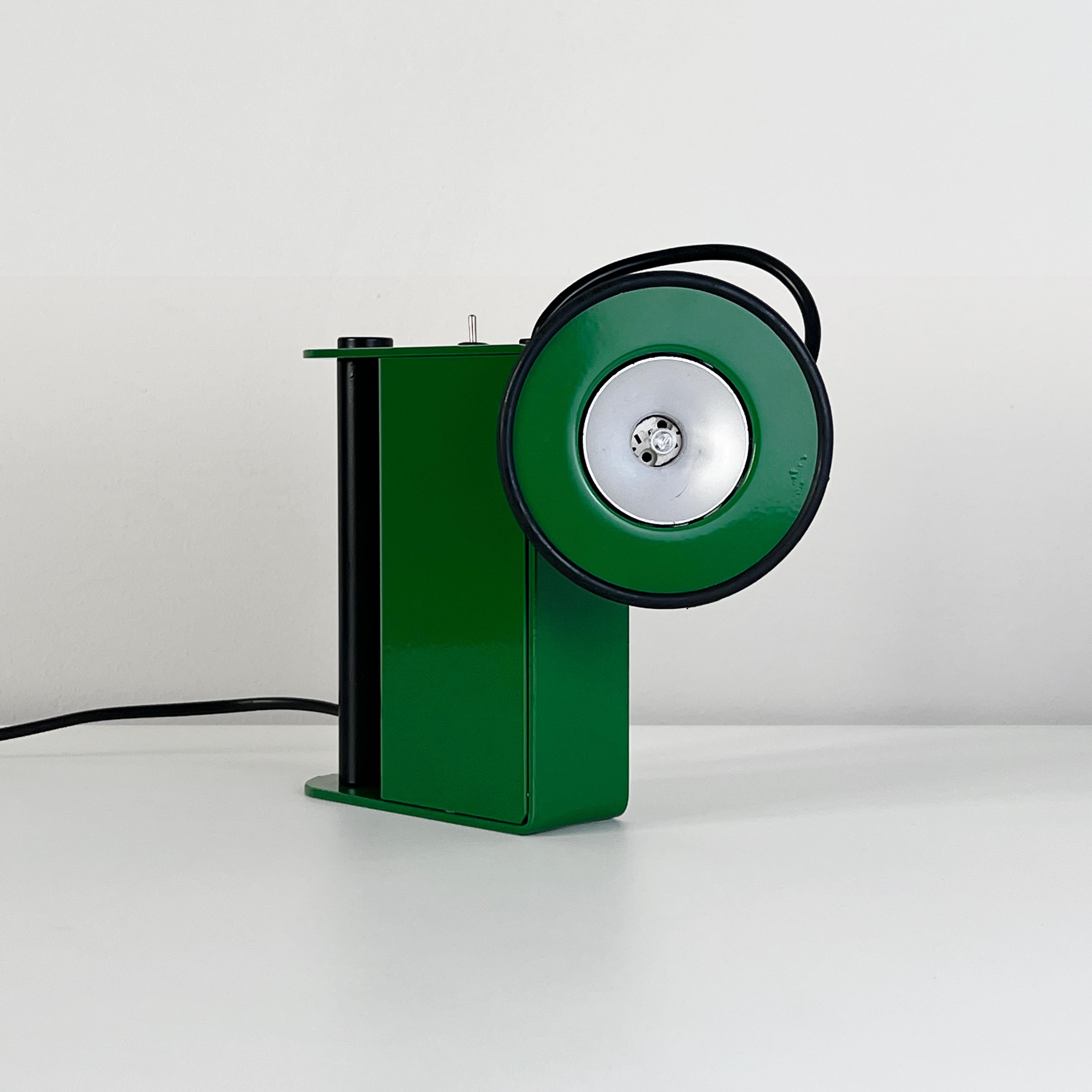 The Green Minibox table lamp, designed by the talented duo Gae Aulenti and Piero Castiglioni and manufactured by Stilnovo in 1980, is a true representation of post-modern, minimalistic, and technical design. This iconic lamp is a testament to the