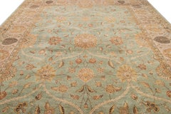 Tapis moderne en laine vert de style Tabriz fait à la main avec motif floral