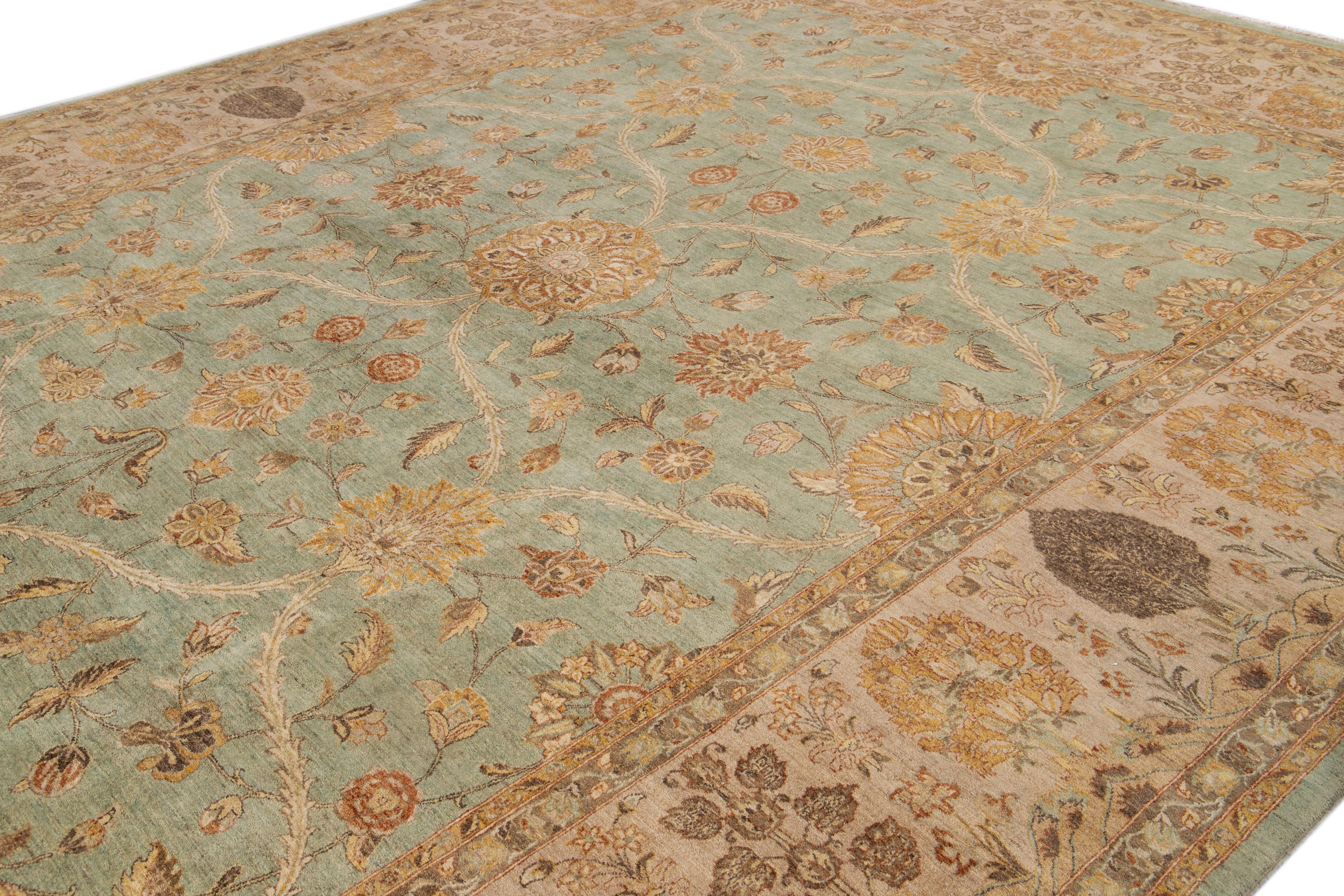 Pakistani Green Modern Tabriz Style Handmade Wool Rug with Floral Motif For Sale