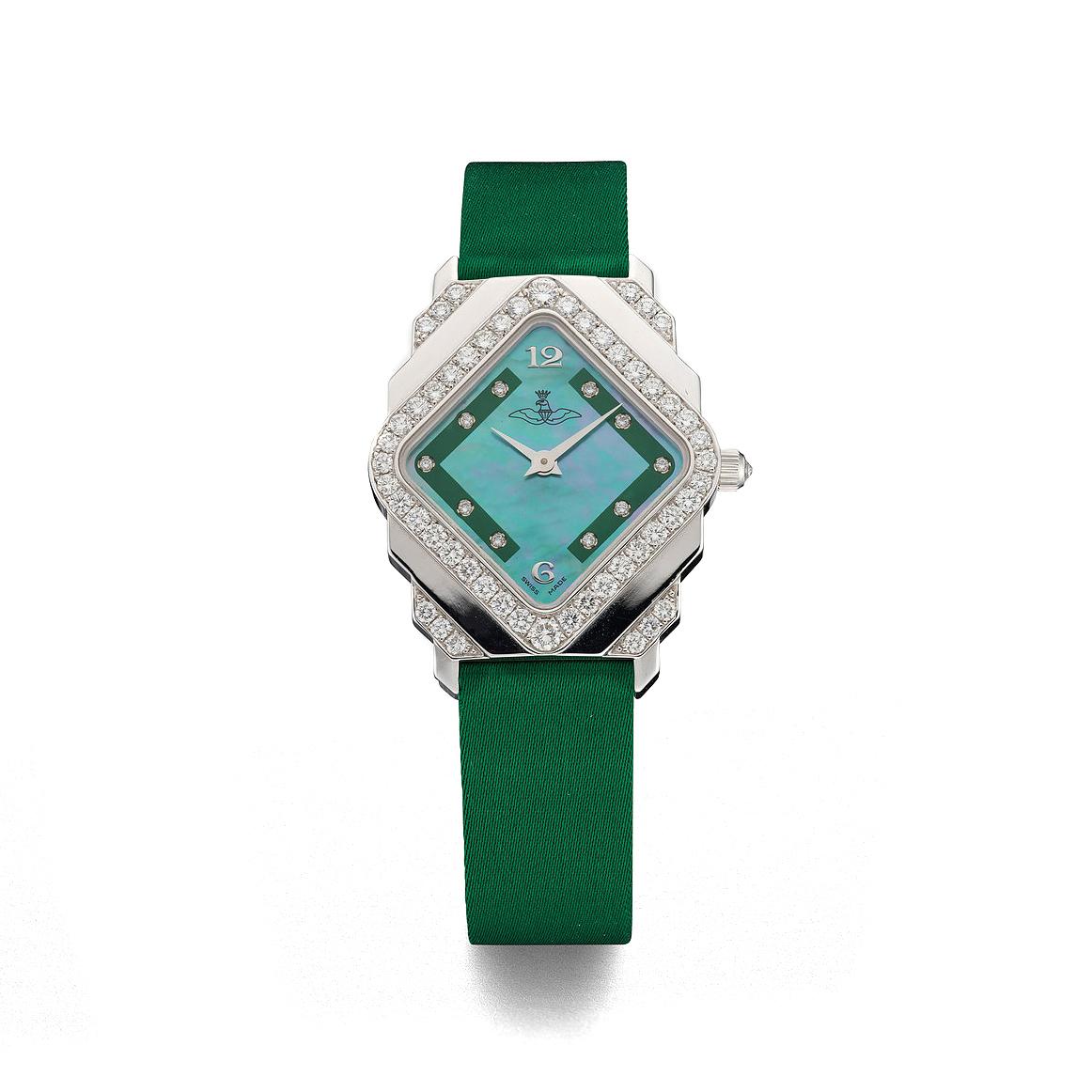 Wristwatch in 18kt white gold green mother of pearl green zone setwith 10 diamonds 0.05 cts bezel and attache set with 52 diamonds1.43 cts prong buckle alligator strap quartz movement.