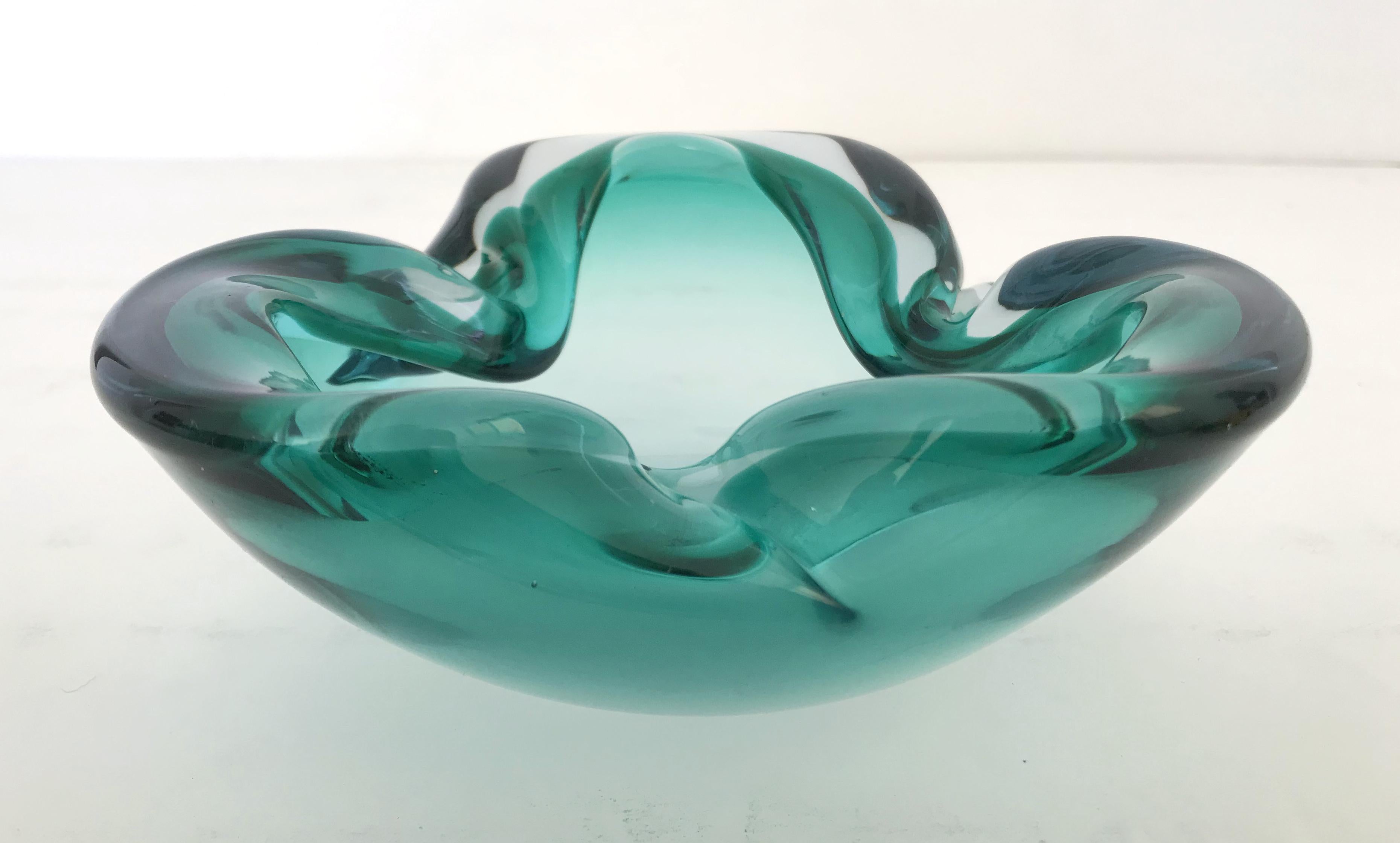 Vintage Italian green Murano glass ashtray or bowl / Made in Italy, circa 1960s
Measures: diameter 6 inches, height 2.5 inches
1 in stock in Palm Springs ON 50% OFF SALE for $449 !!
Order Reference #: FABIOLTD G168
This piece makes for great and