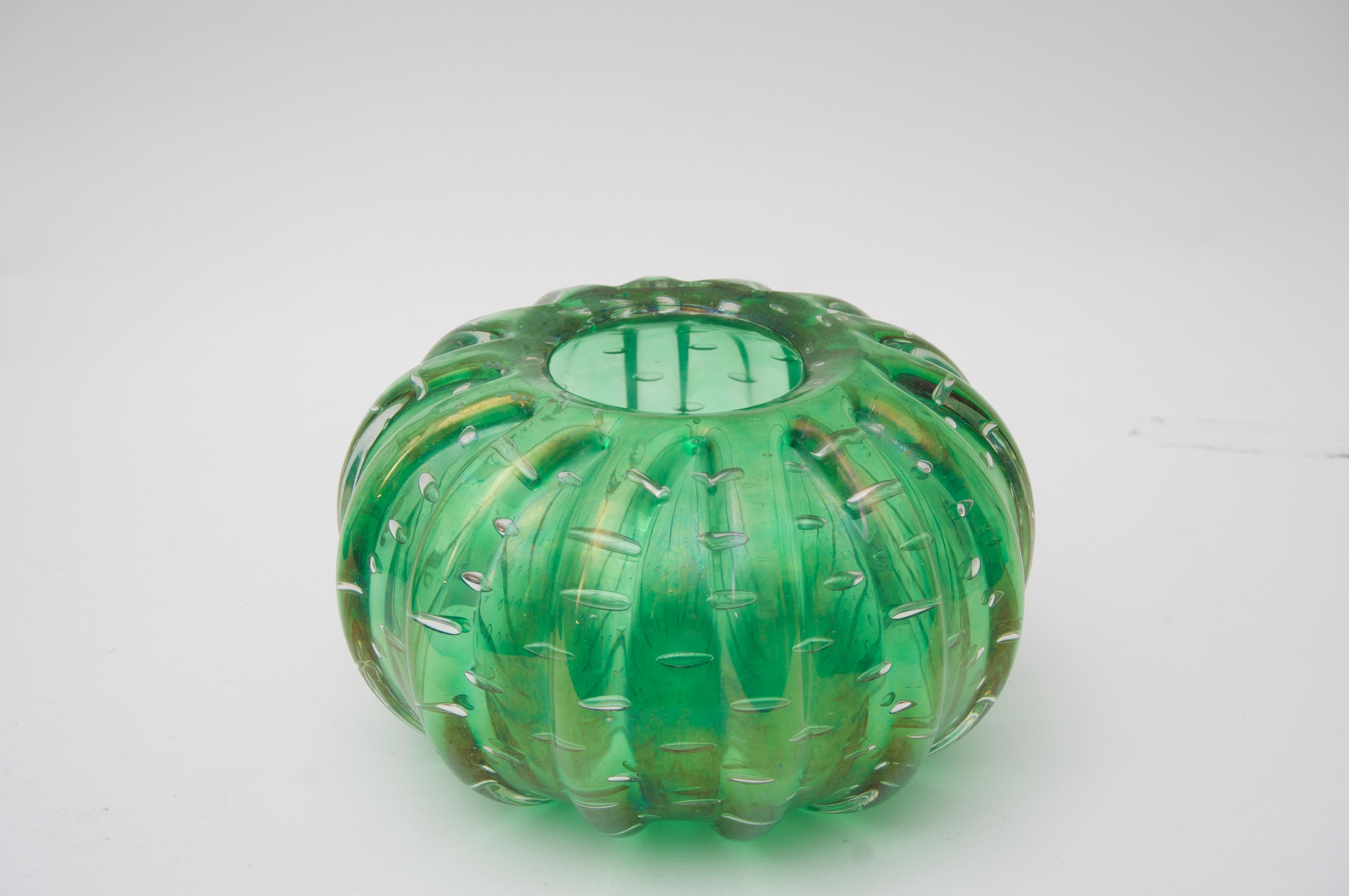This stylish and chic Barovier et Toso Murano emerald green glass vase dates to the 1950s and will make a wonderful piece for cut flowers or simply as a beautiful object de art.

Note:  Light surface wear to the underside ( see last three images ).
