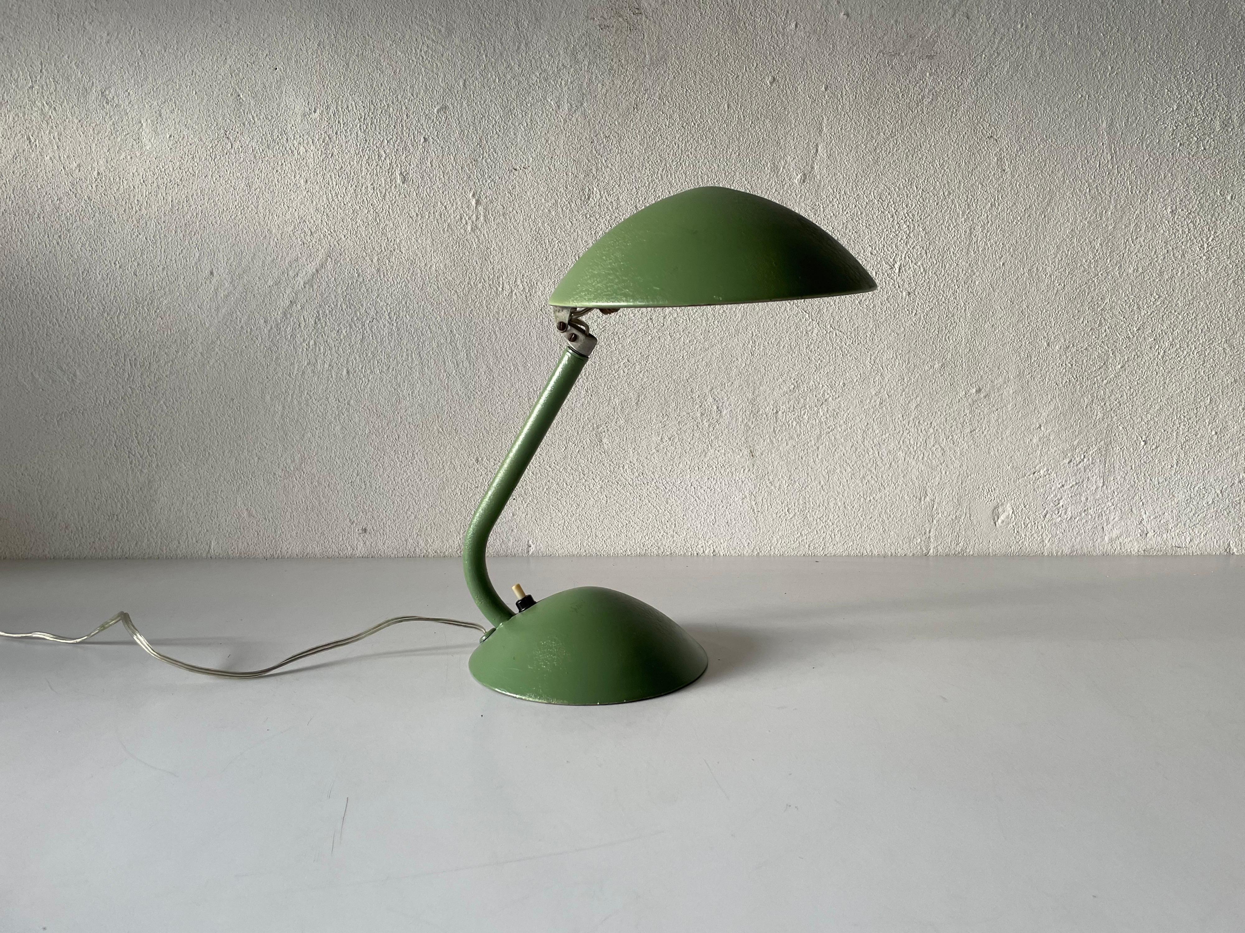 Green mushroom desk lamp by Nottilux, 1950s, Italy
Model Junior Nova

Minimal design 
Very high quality.
Fully functional.
Adjustable shade.

Original cable and plug. Switch on-off on the base. 
This lamp is suitable for EU plug socket.