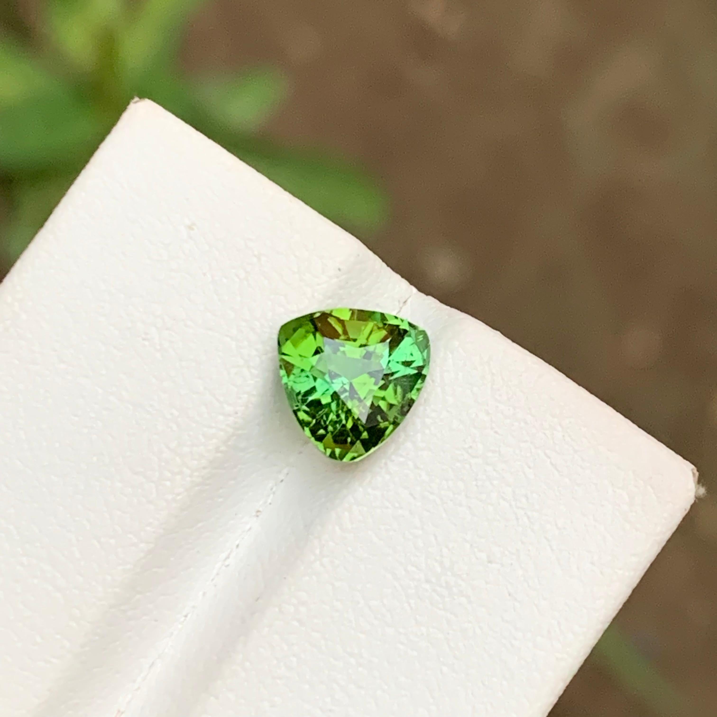 GEMSTONE TYPE: Natural Tourmaline 
PIECE(S): 1
WEIGHT: 2.25 Carats
SHAPE: Trillion Cut
SIZE (MM): 7.97 x 8.26 x 5.86
COLOR: Green
CLARITY: Approx Eye Clean
TREATMENT: None
ORIGIN: Afghanistan
CERTIFICATE: On demand
(if you require a certificate,