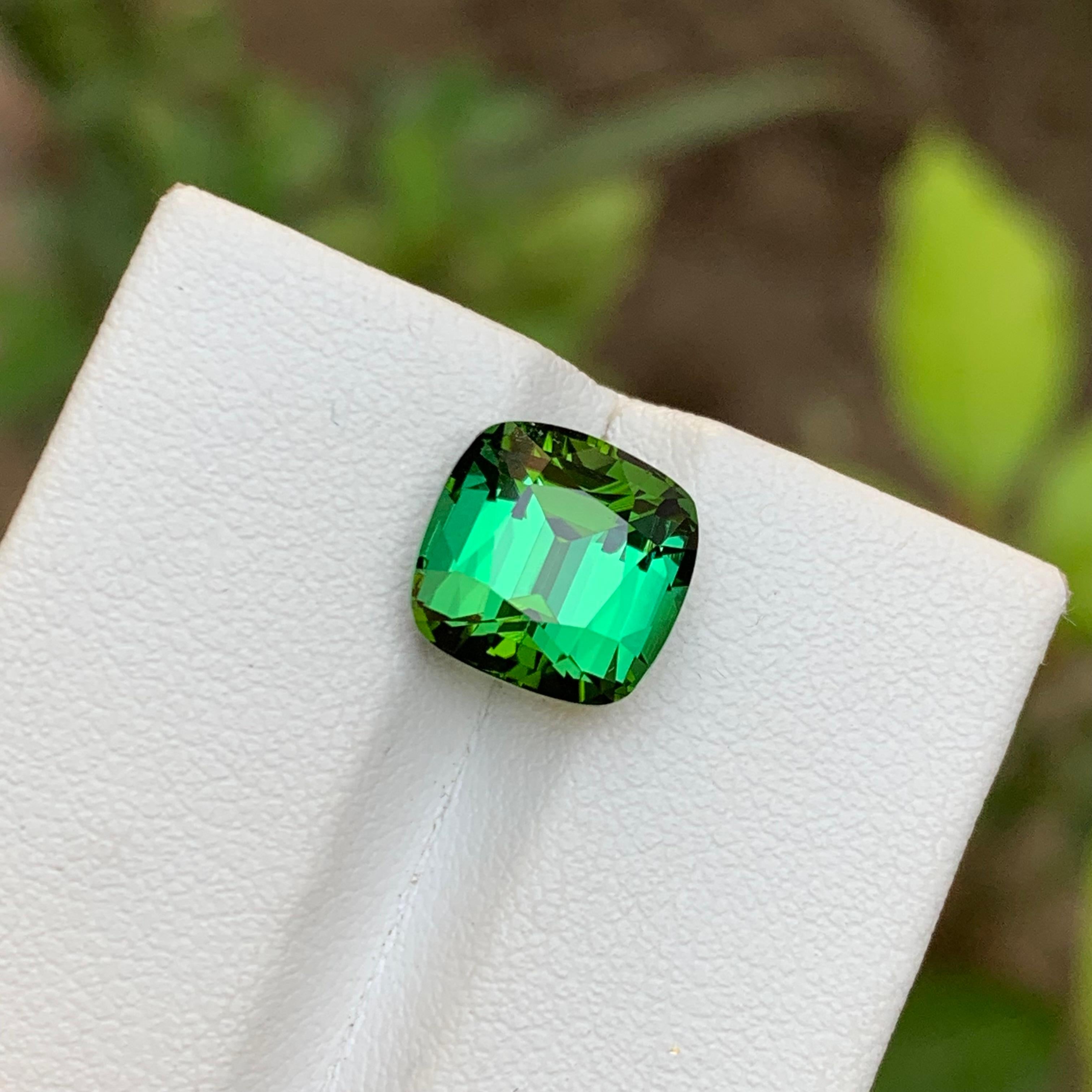 GEMSTONE TYPE: Natural Tourmaline 
PIECE(S): 1
WEIGHT: 4.65 Carats
SHAPE: Cushion Cut
SIZE (MM): 9.24 x 9.44 x 7.14
COLOR: Green
CLARITY: Approx 98% Eye Clean
TREATMENT: None
ORIGIN: Afghanistan
CERTIFICATE: On demand
(if you require a certificate,