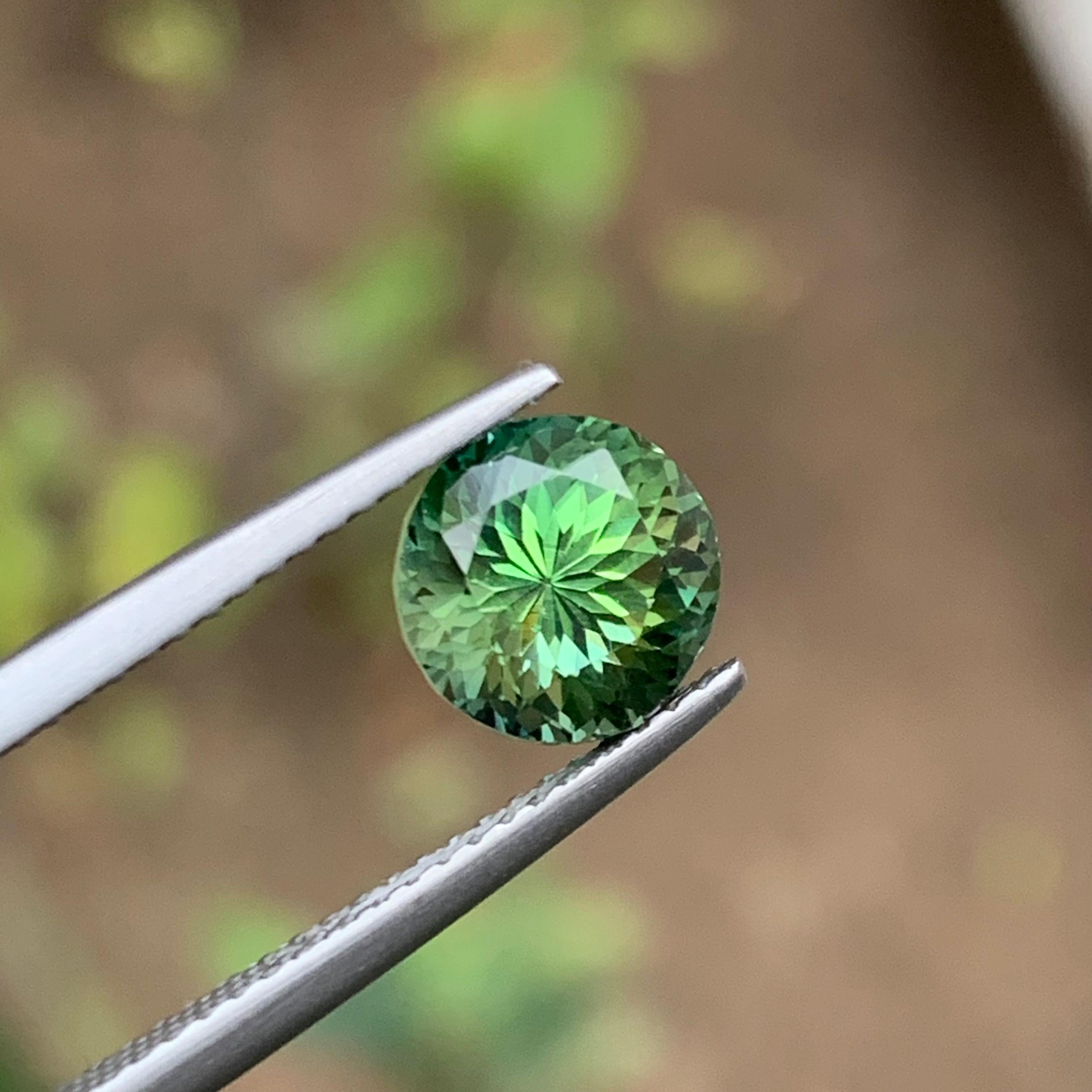 Green Natural Tourmaline Loose Gemstone  for Ring, or any other Jewelry Setting-Round Brilliant Cut from Kunar Afghanistan!!

💎 GEMSTONE TYPE: Tourmaline 
⚖️ WEIGHT: 2.60 Carats
🪚 SHAPE & CUT: Round Brilliant Cut
📏 SIZE (MM): 7.73 x 7.56 x