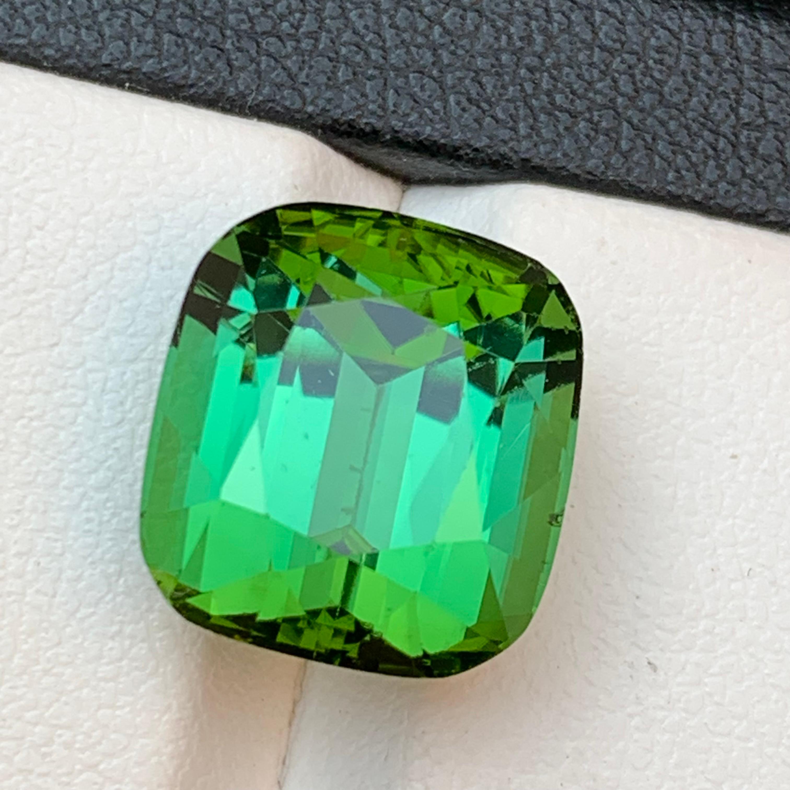 Green Natural Tourmaline Loose Gemstone for Ring, Necklace Pendant or any other Jewelry Setting- Cushion Cut!!

💎 GEMSTONE TYPE: Tourmaline 
⚖️ WEIGHT: 12.95 Carats 
🪚 SHAPE & CUT: Cushion Cut
📏 SIZE (MM): 13.27 x 12.12 x 10.31
🌈 COLOR: Green
🔎