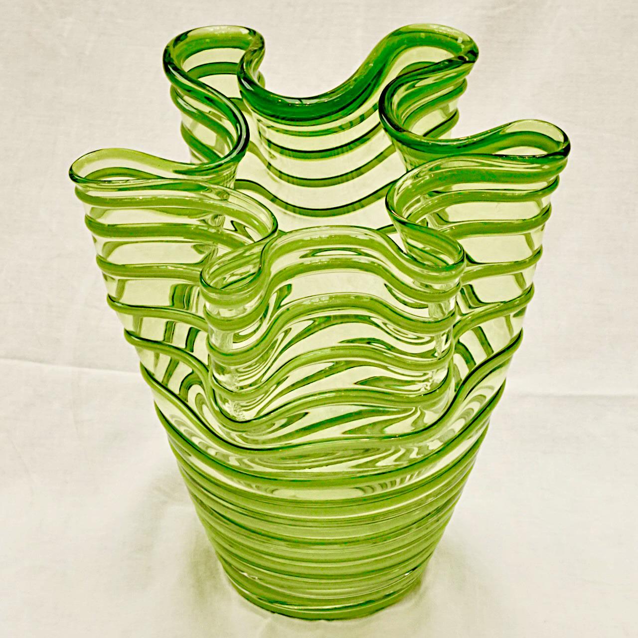 Heavy hand made striped art glass handkerchief vase, in a beautiful green on green colourway. The vase has a lovely folded organic shape. It is in very good condition. Measuring diameter 20cm / 7.87 inches and height 23.5 cm / 9.25 inches.

This