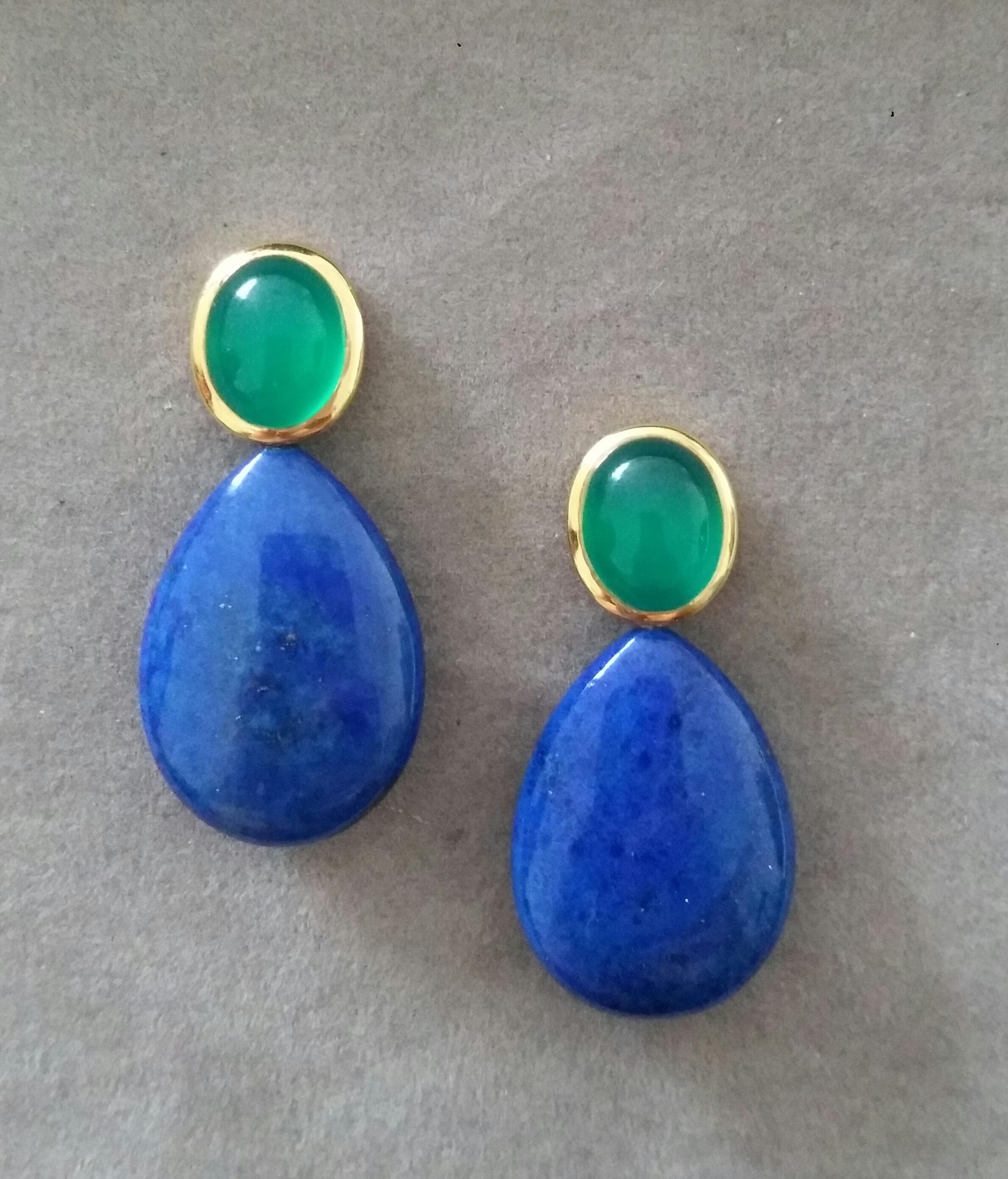 Elegant and completely handmade Earrings consisting of  upper parts of 2 oval shape Green Onyx Cabs measuring 9x11 mm  in 14 Kt yellow gold bezel , in the lower part we have 2 Natural Color Lapis Lazuli Flat Plain Drops measuring 18x25 mm and 7mm