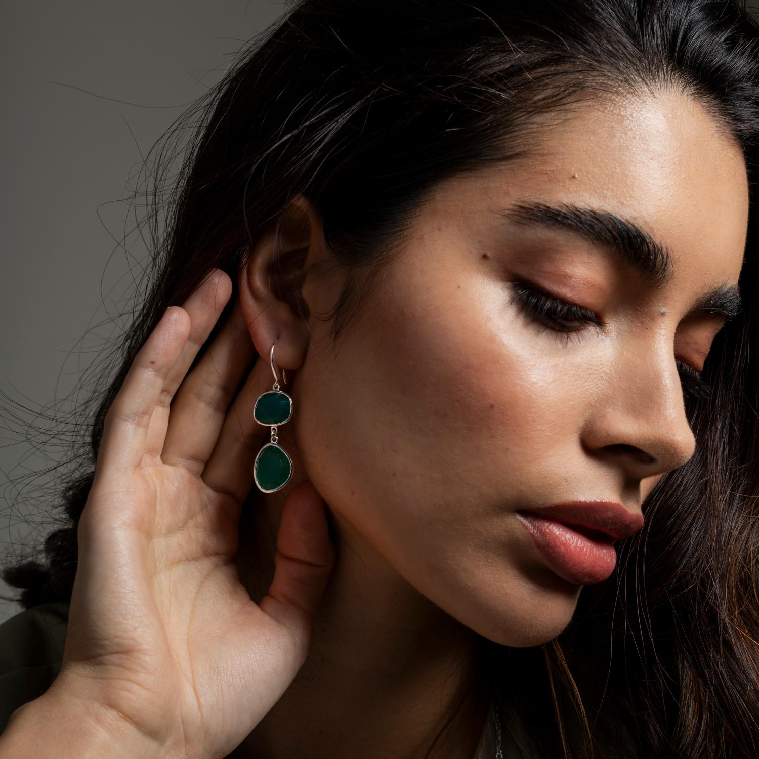 Combining natural forms with contemporary design, these sterling silver earrings are adorned with two green onyx gemstones.

Gemstone sizes - approx. 10-14mm
Total length - 50mm

We have been creating a wonderful world of everyday and fine jewellery