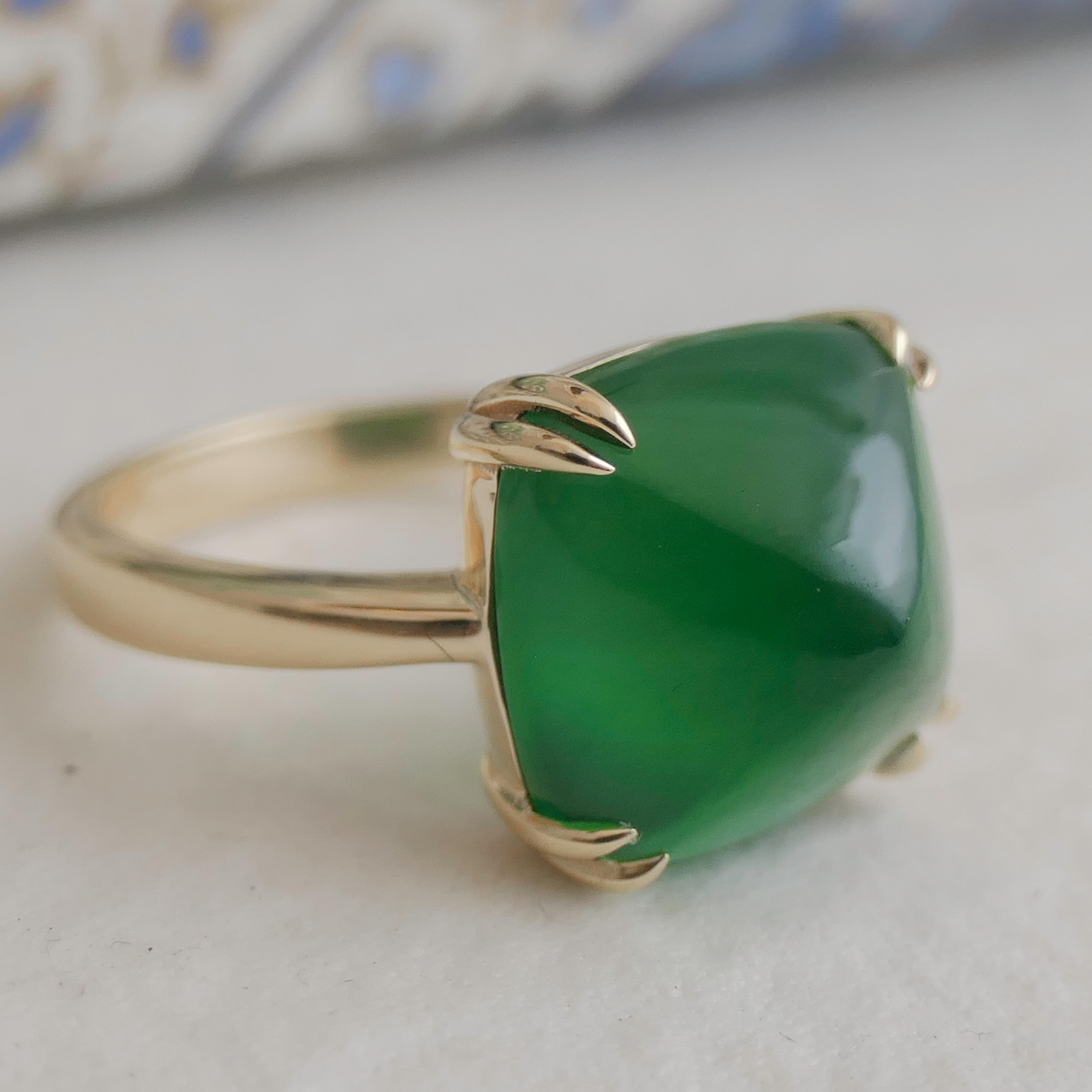 Features a 12x12mm Sugar Loaf cut  Green Onyx gemstone, expertly prong-set in high-quality gold plated sterling silver.
Handcrafted with attention to detail, ensuring a unique and exquisite piece of jewelry.
The rich green  hue of the chalcedony is