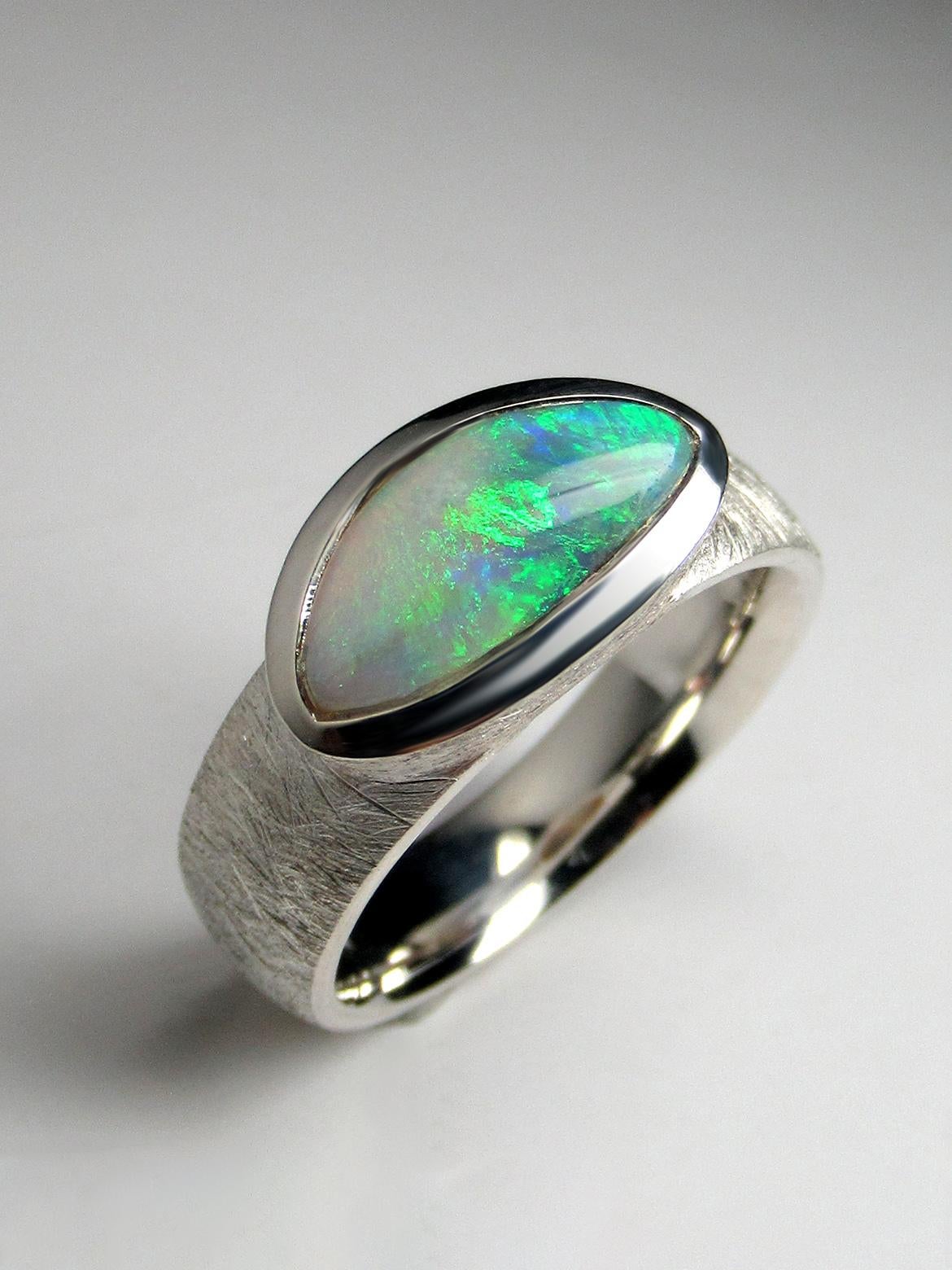 Silver ring with natural precious green Opal
Opal origin - Australia
gemstone measurements 0.24 х 055 in / 6 х 14 mm
ring weight - 7.3 grams
ring size - 7 3/4 US