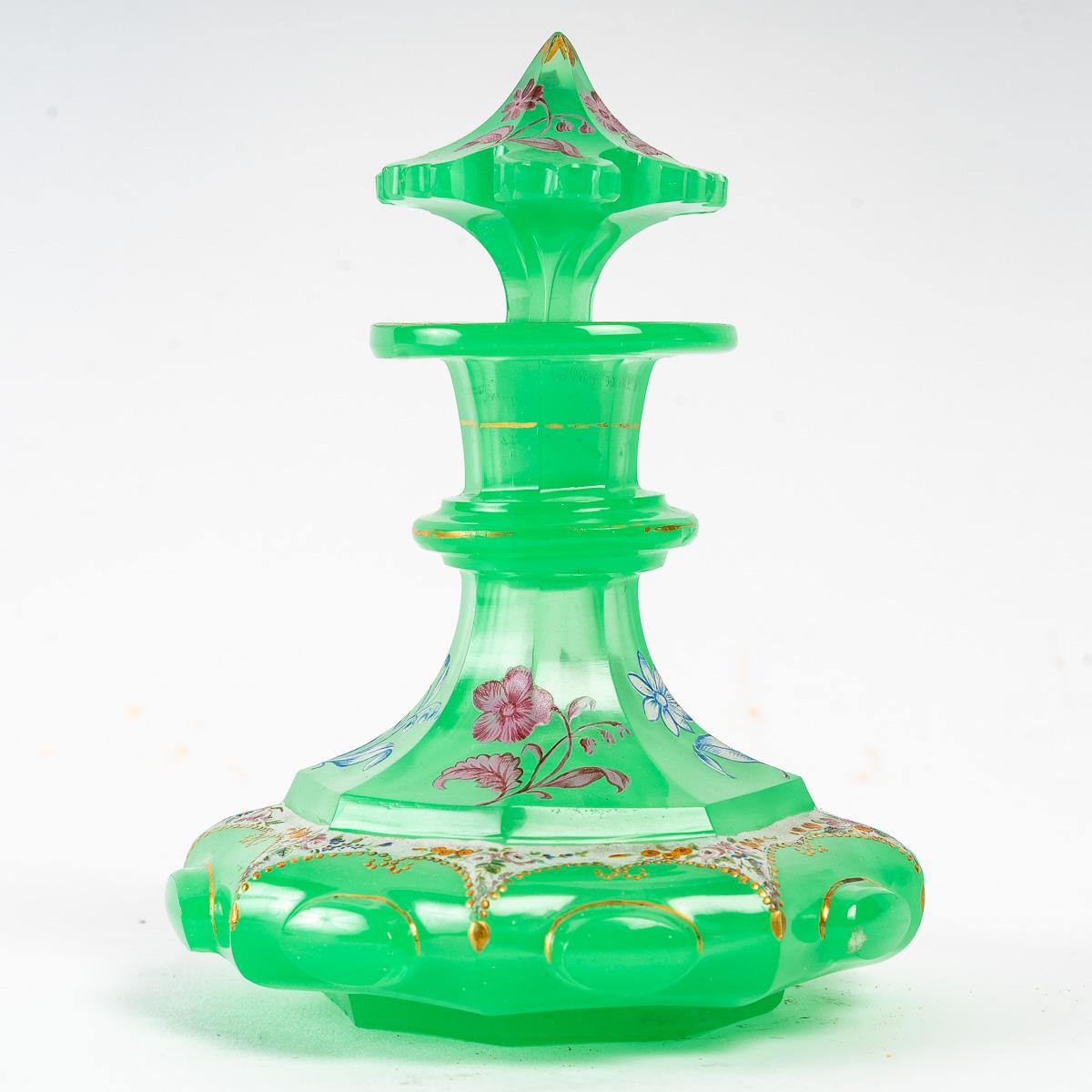 Green Opaline perfume bottle, 19th century
green enamelled opaline perfume bottles with floral decoration, 19th century, Napoleon III period.
Measures: H: 13.5 cm, d: 11 cm.
 
