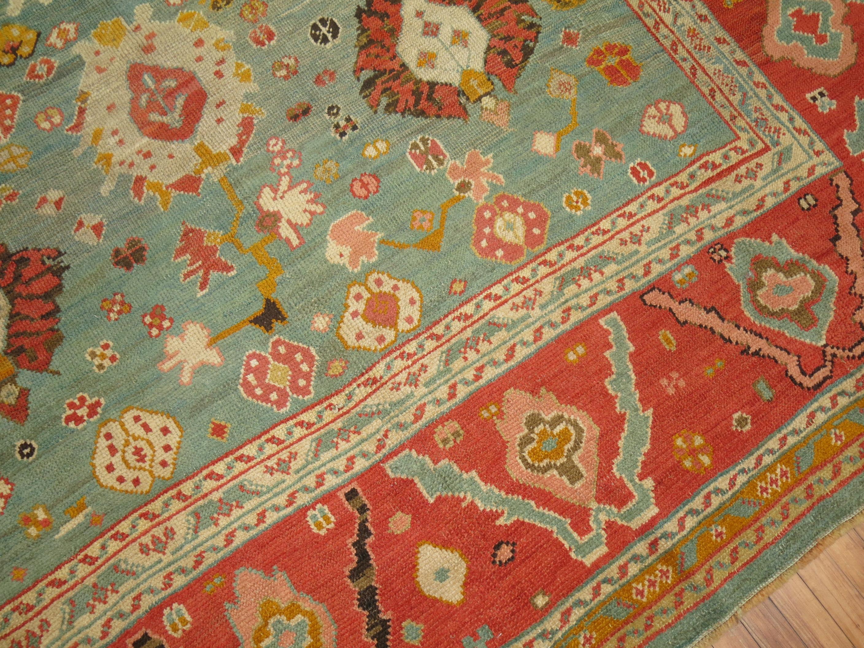 Alfombra Oushak Antigua Verde Naranja Turco en venta