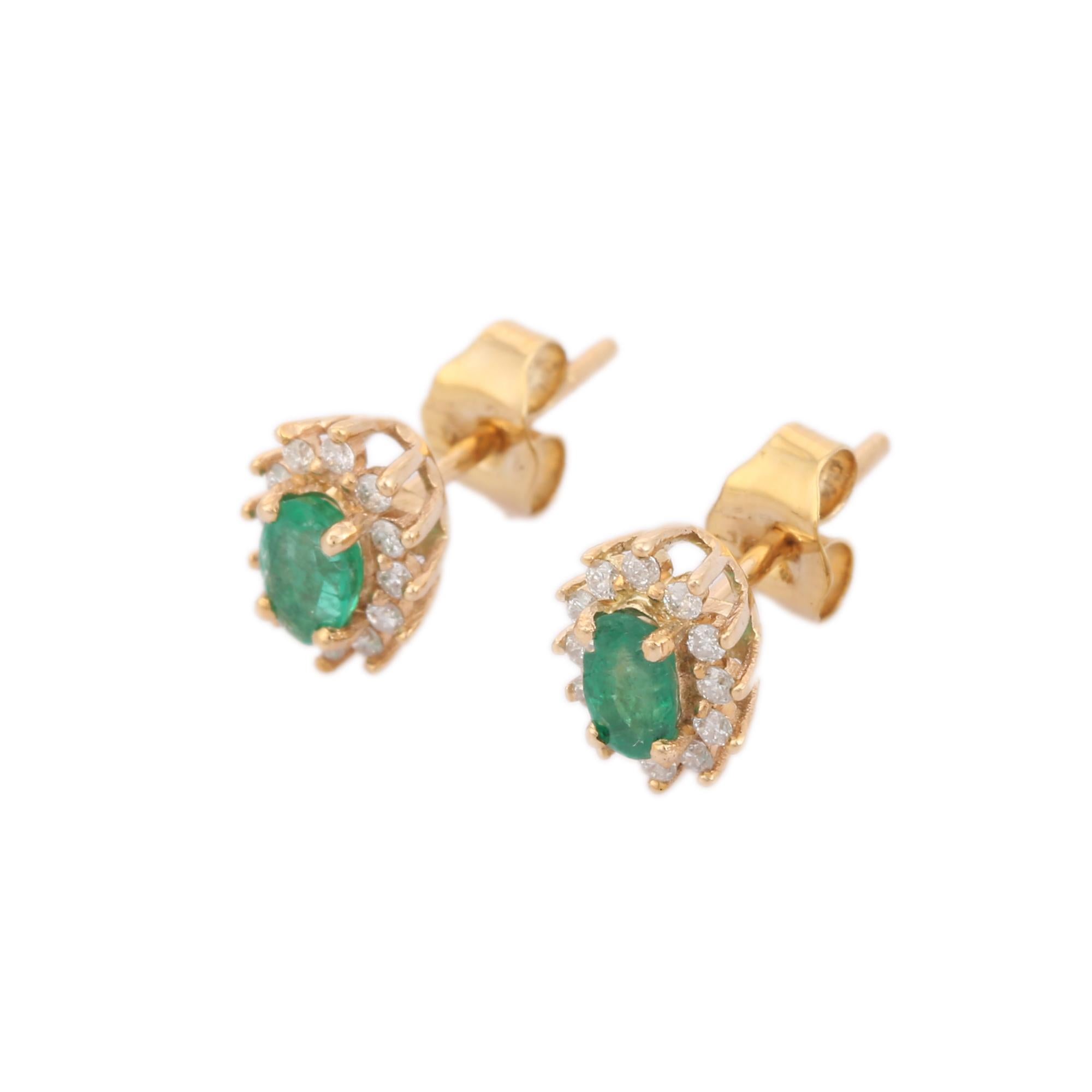 Earrings create a subtle beauty while showcasing the colors of the natural precious gemstones and illuminating diamonds making a statement.

Oval Cut Emerald and Diamond Halo Stud Earrings in 14K gold. Embrace your look with these stunning pair of