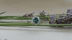 Green Oval Emerald 0.85K Diamonds 0.12K White Gold Engagement Ring
