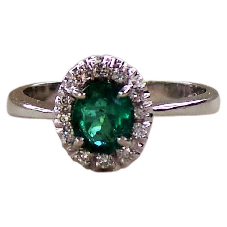 Green Oval Emerald 0.85K Diamonds 0.12K White Gold Engagement Ring For Sale