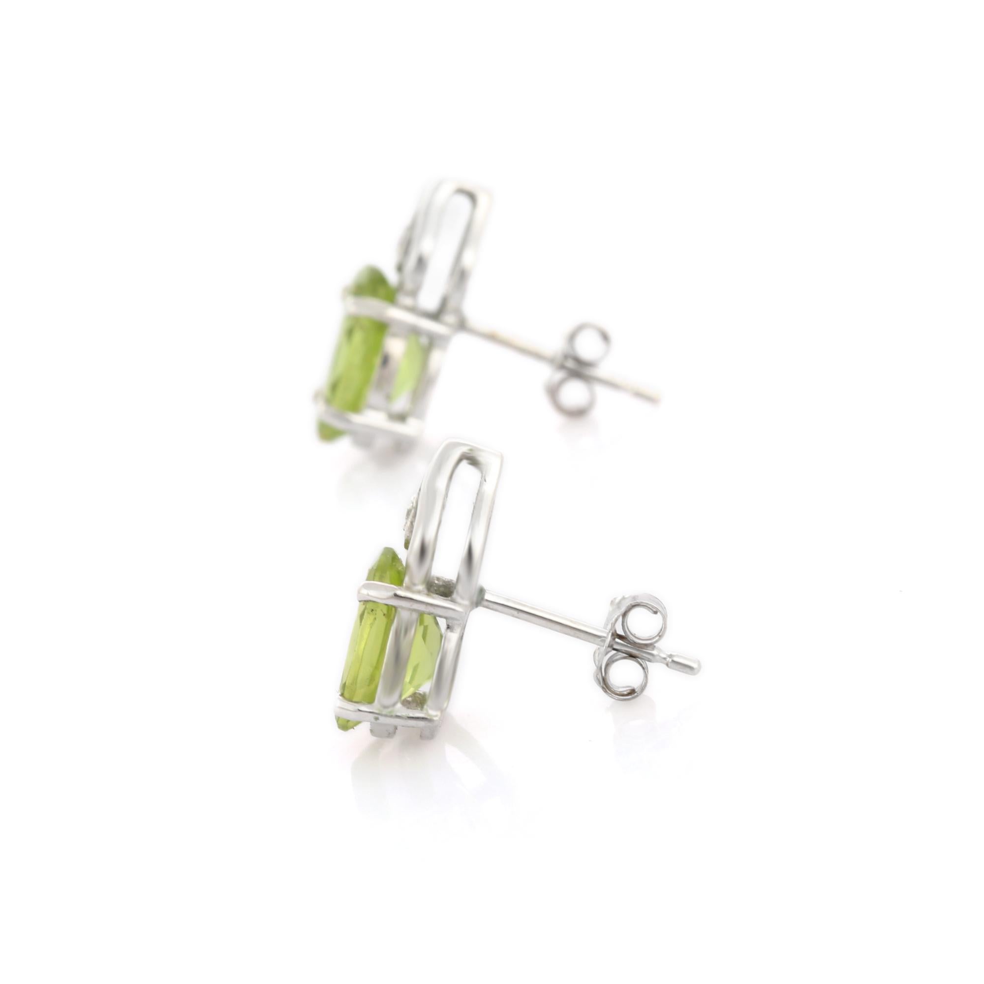 Oval Cut Green Oval Peridot Gemstone Stud Earrings with Diamonds in 14K White Gold  For Sale