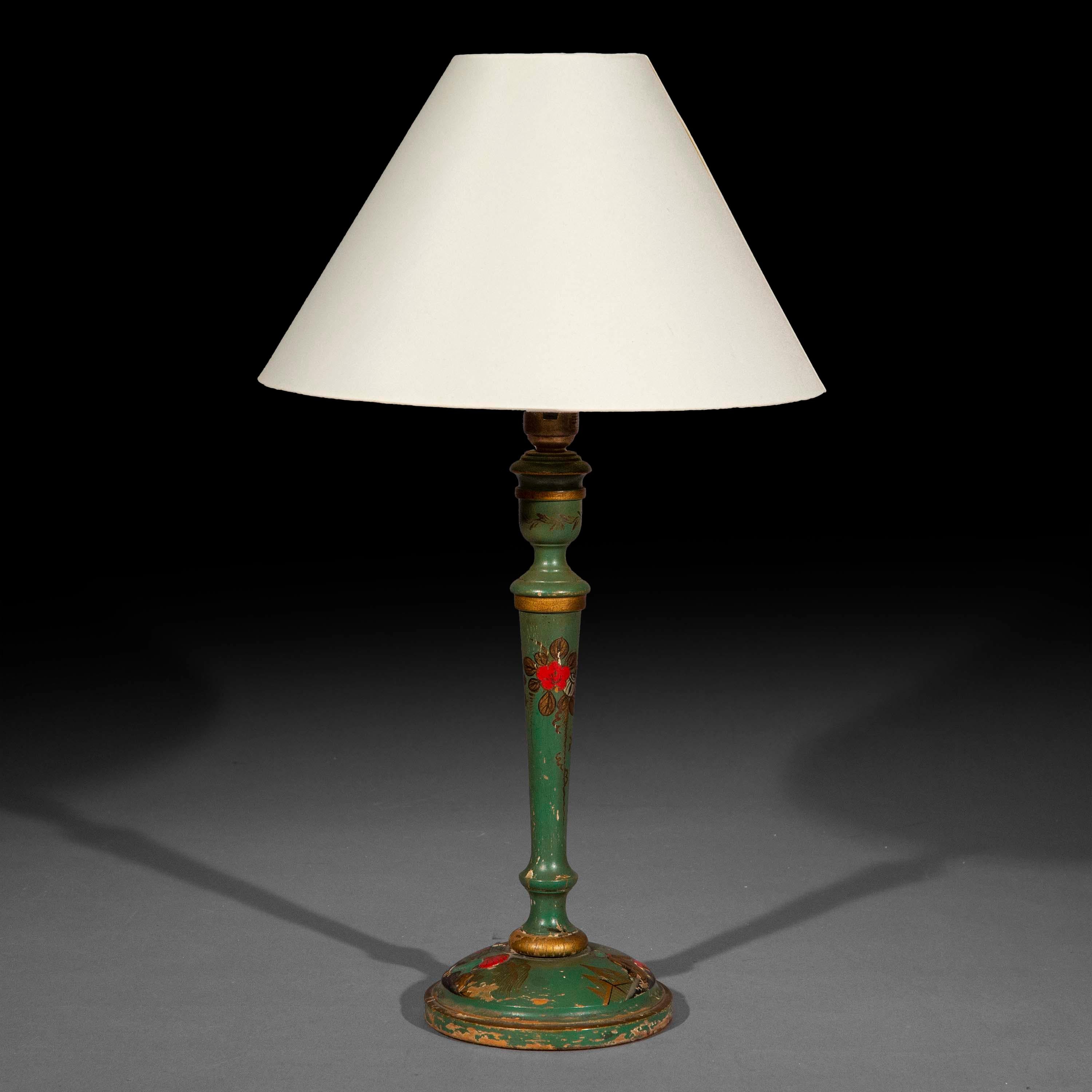A very decorative Chinoiserie candlestick lamp, painted with oriental motifs on green ground.
Probably English, mid-20th century. Decoration distressed.

Why we like it
A very chic small lamp to add a playful accent to an eclectic
