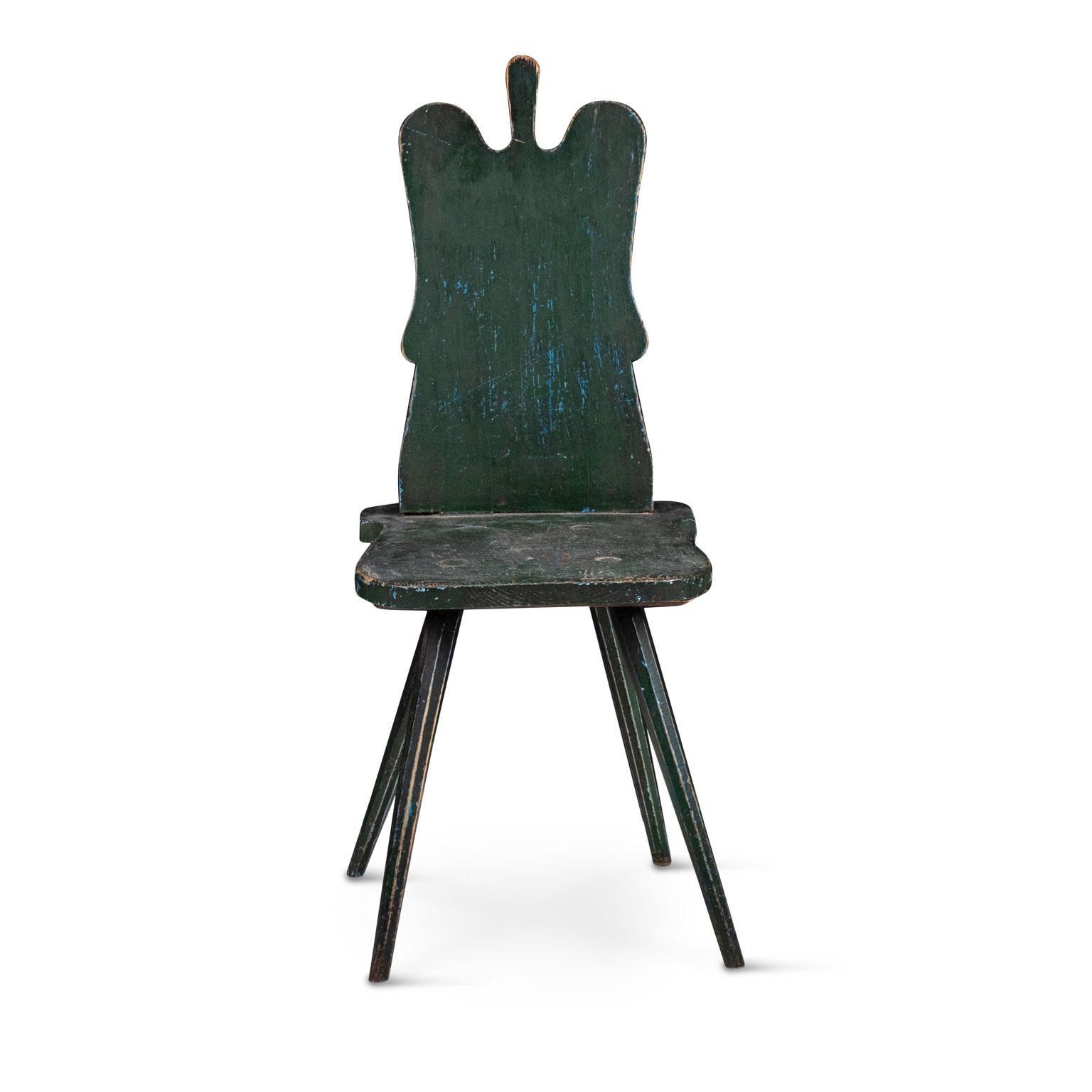 Green painted Swedish Folk Art chair, circa 1780. Pegged construction vernacular side chair in layers of early milk paint: green over blues.