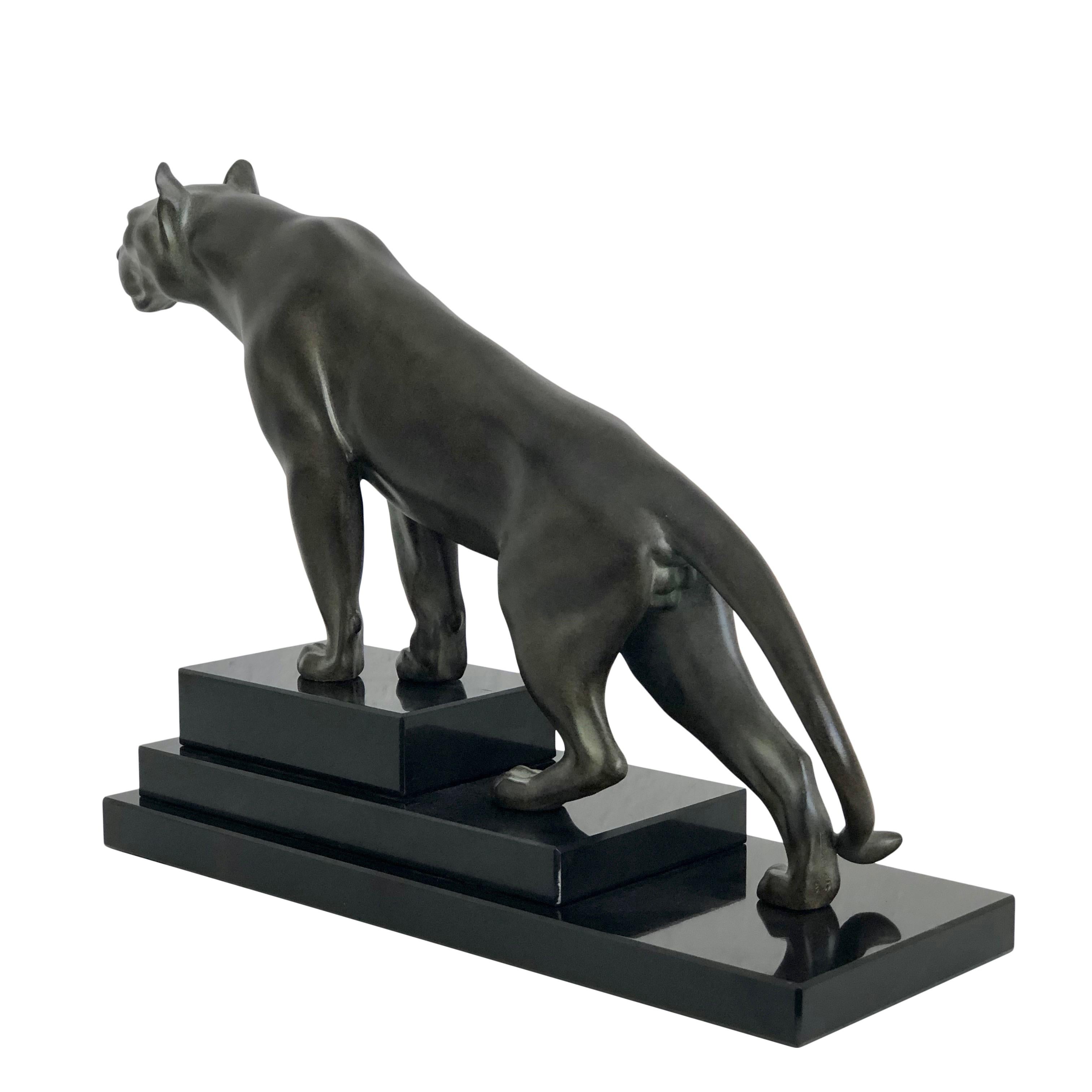 Panther sculpture named “Jungle” on a stepped marble base. 
Original “Max Le Verrier”, signed 
Designed in France during the roaring 1920s by “Max Le Verrier” (1891-1973) 
Art Deco style, France 

Sculpture made in “Régule” (spelter) 
Socle in