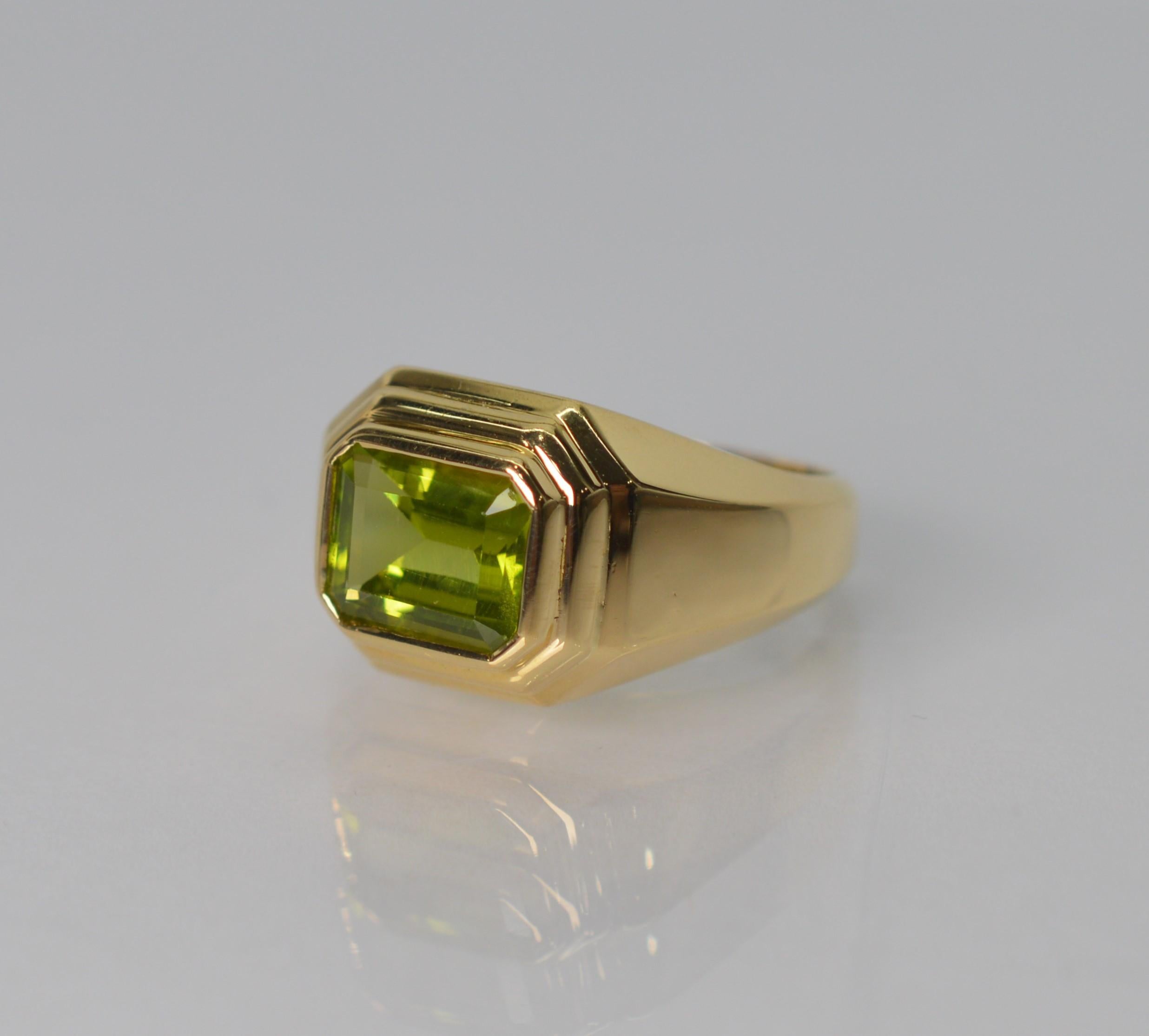 Called  a “gem of the sun” by ancient Egyptians, the peridot spiritually represents positive power and strength.  A 1.7 carat fine emerald-cut natural peridot stone with beautiful yellow-green hues sits a top steps of polished eighteen karat (18K)