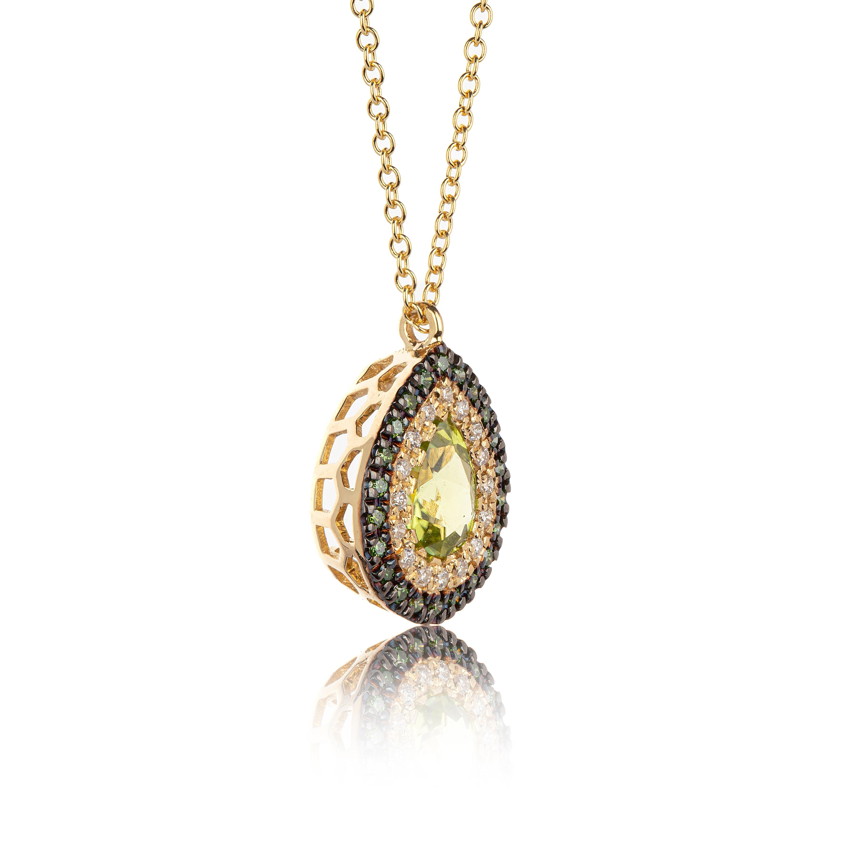 Green Peridot Pear Shape Necklace in 18Kt Yellow Gold with pave  Diamonds. The stones are blue and white diamonds pave setting and the peridot in the center of the necklace is pear cut.
The blue and white diamonds that surround the central peridot 