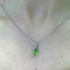 Green peridot pear shaped pendant necklace 18k white gold