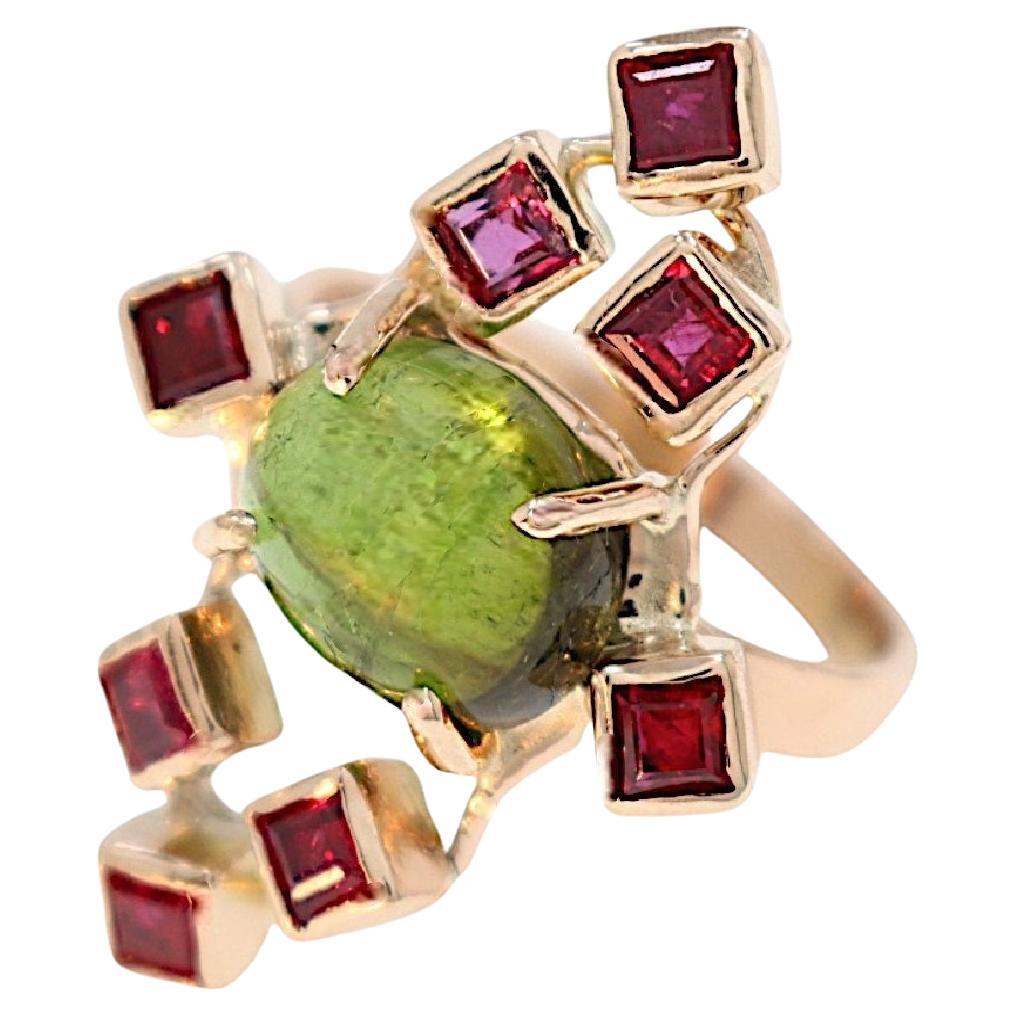 Peridoto verde Rubíes rojos Anillo de oro rosa Botta Gioielli