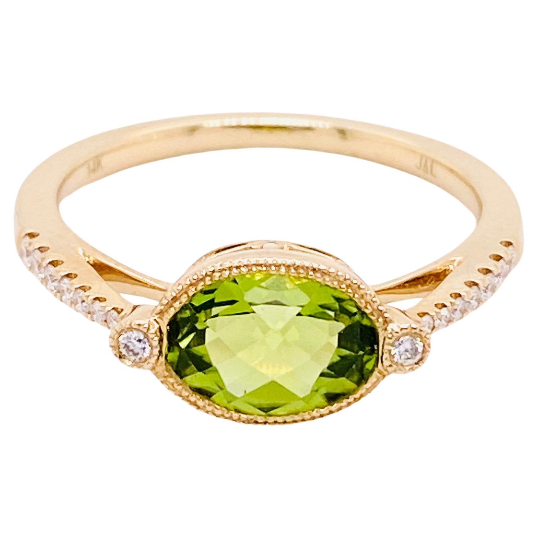 Green Peridot Ring w Oval Peridot Set East to West with Diamonds in 14 KT Yellow For Sale