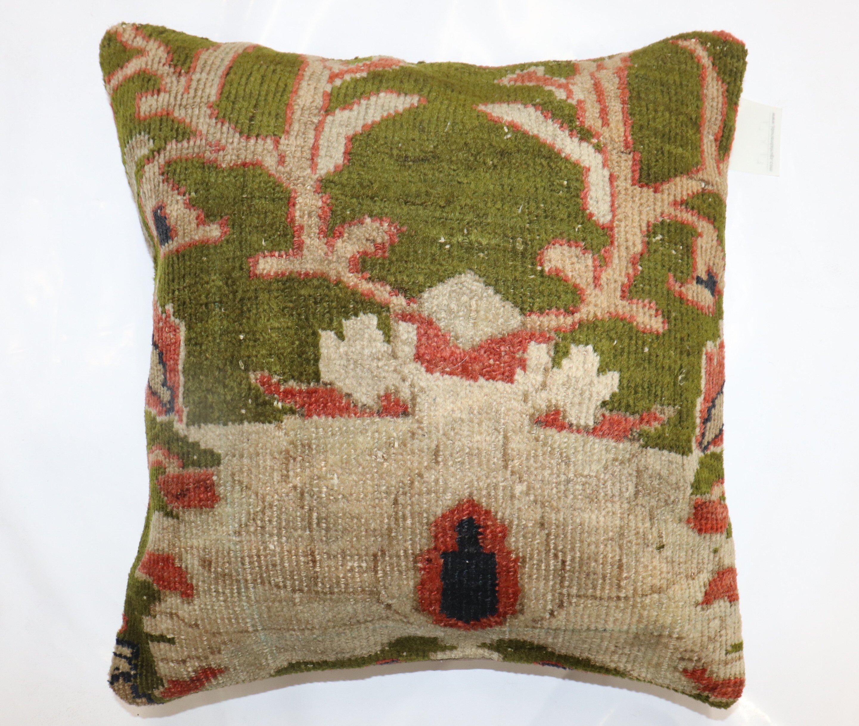 Pillow made from a late 19th century Persian Sultanabad rug in green

Measures: 19'' x 19''.
