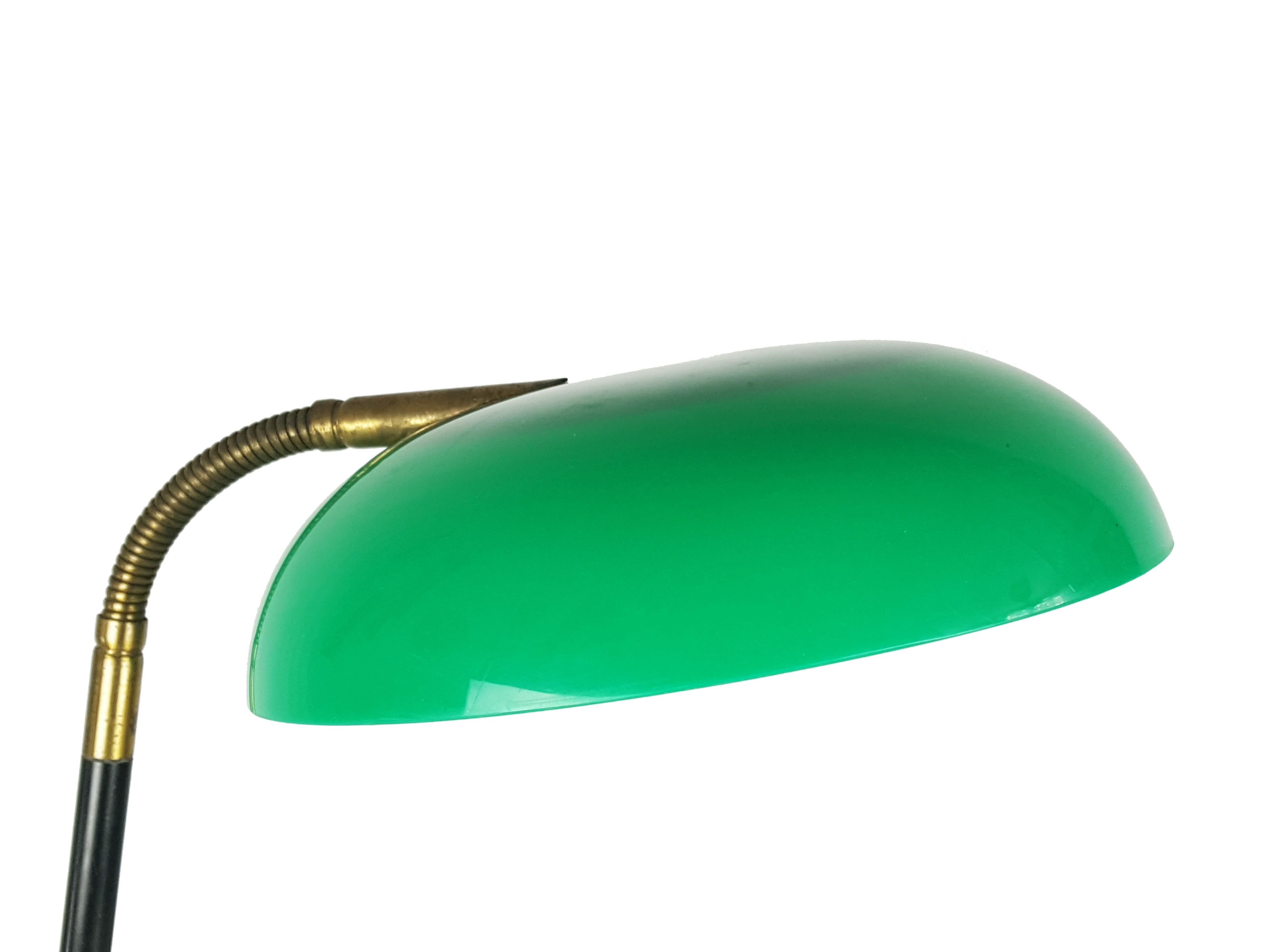 Adjustable table or desk lamp designed and produced by Stilux, Milan in the 1960s. White marble base, painted brass structure with green perspex shade. The lamp features 2 small light bulbs.