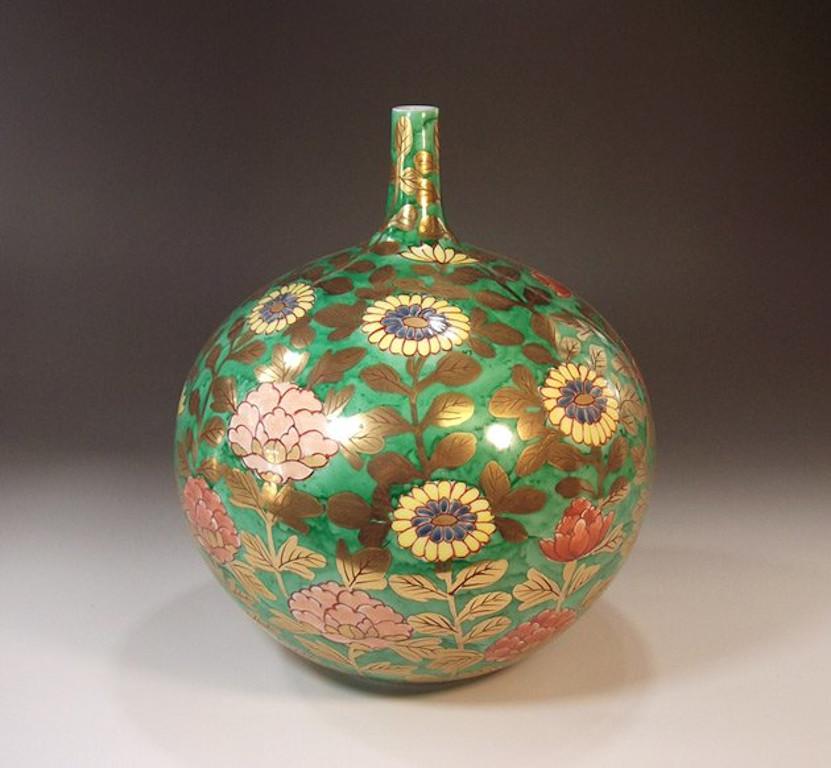 Exquisite contemporary Japanese porcelain decorative vase hand painted in gold, pink, red and green on an elegant bottle shape body, a signed work by highly acclaimed Japanese master porcelain artist in Imari-Arita tradition of Japan, and recipient
