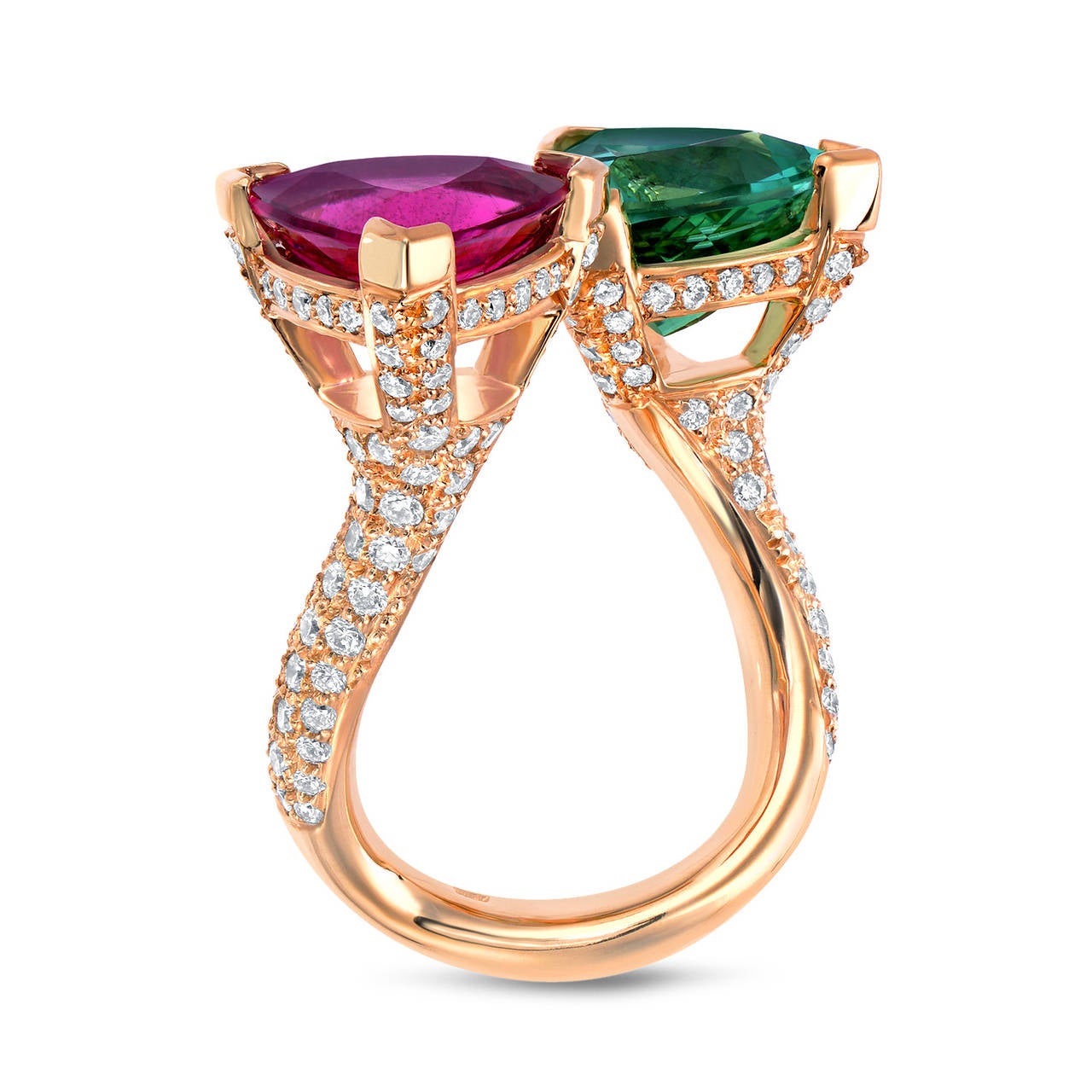 Marvelous 3.32 carat trillion Mint Green Tourmaline and 2.82 carat trillion Pink Tourmaline are showcased together in this conversational 1.11 carat diamond 18K yellow gold ring. 
Size 6.5. Resizing is complimentary upon request.
Returns are