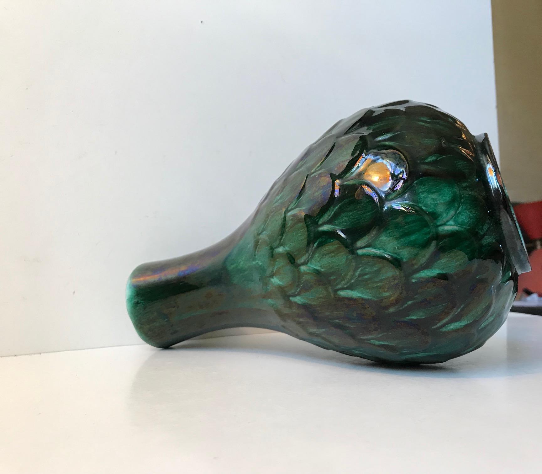 - A voluminous pottery vase with dragon scale or Artichoke pattern relief
- Stunning glossy green glaze
- Designed by Vicke Lindstrand for Upsala Ekeby in the 1940s
- It is marked with designer initials and makers mark
- Please read the