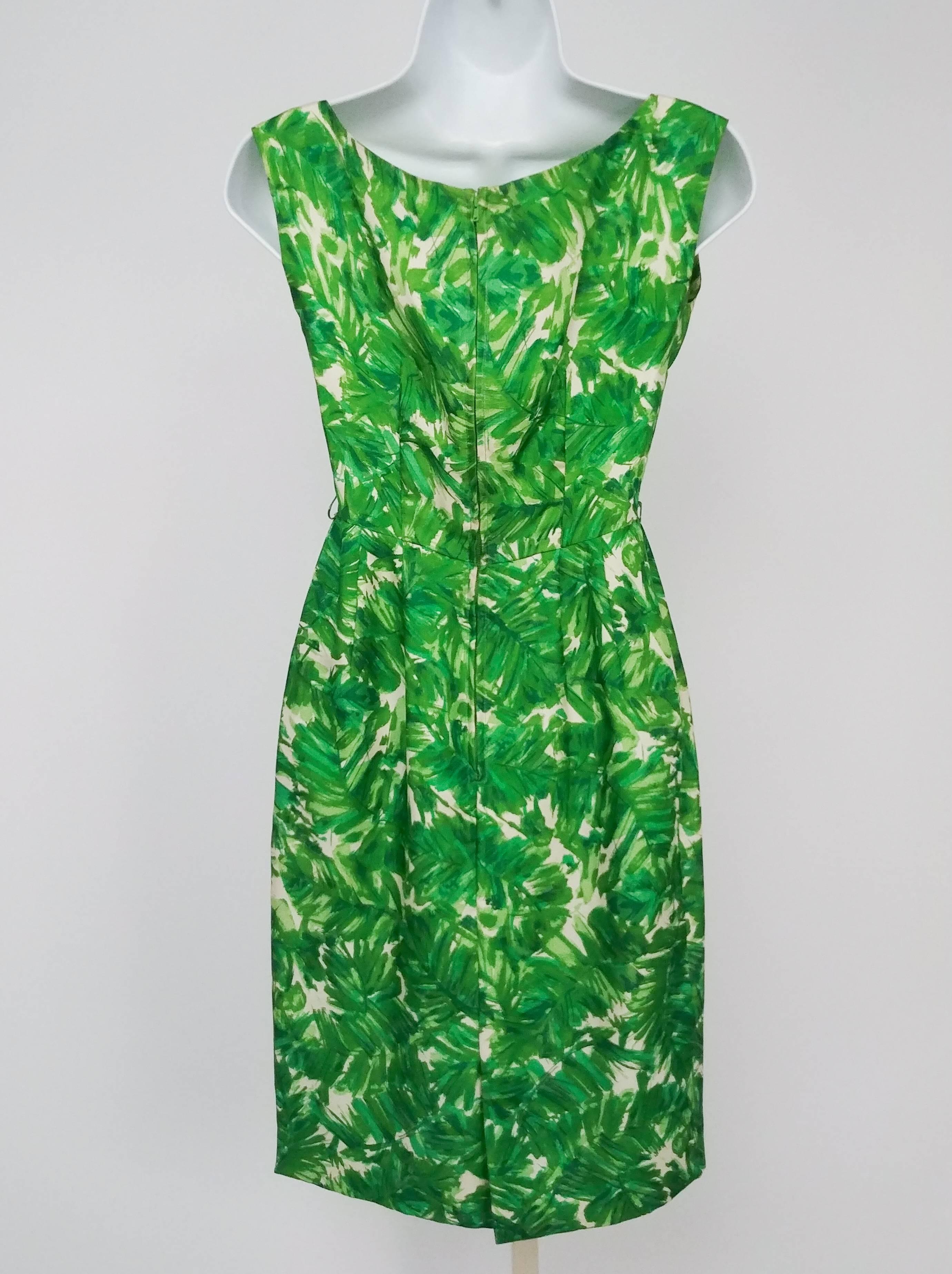 Green Printed Silk Sheath Dress, 1960s. Brightly printed silk sheath dress, zips up back. 