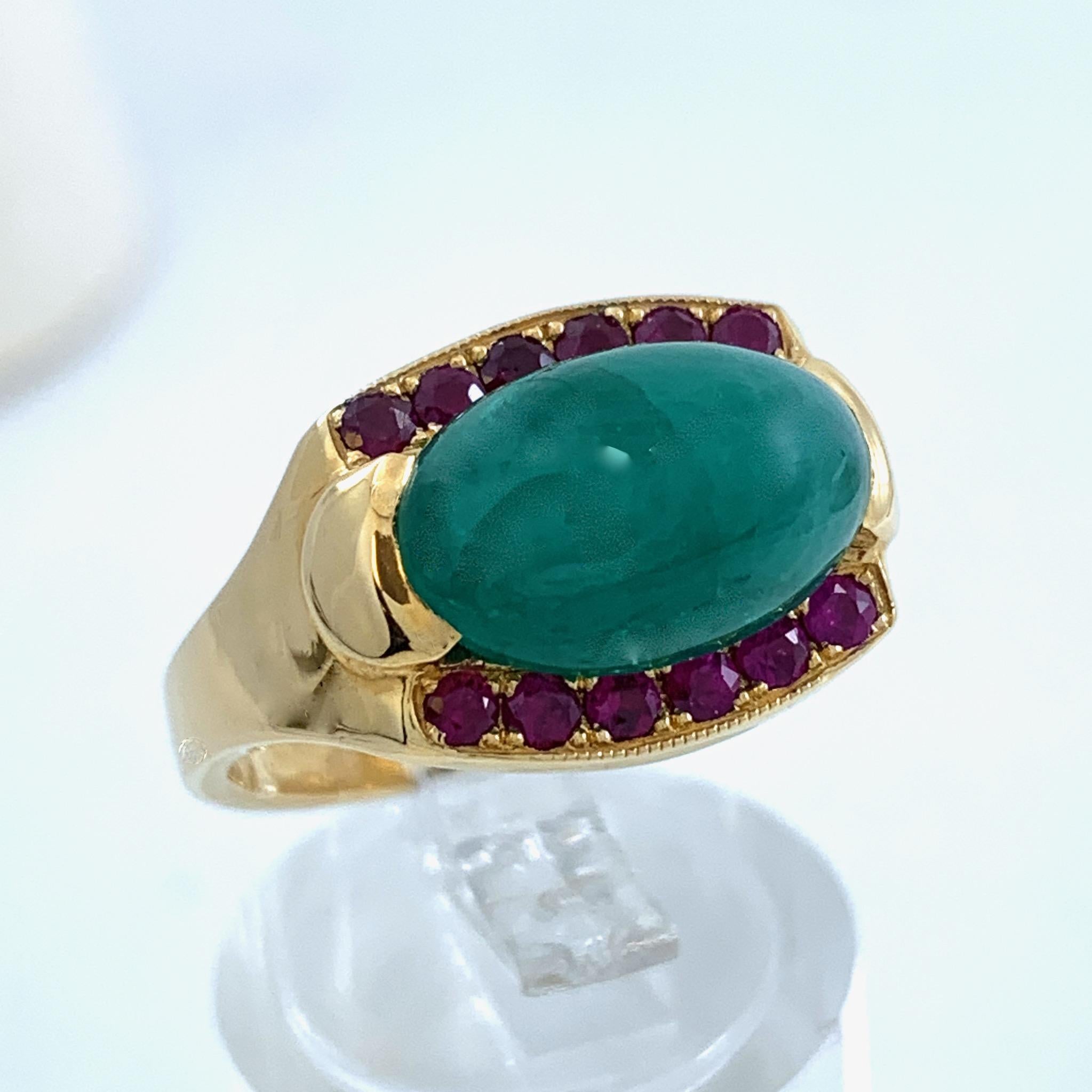 All jewelers have a gem box where they toss stray stones.  After 47 years, Eytan Brandes has a really, really big gem box.  More like a gem crate.  

This scrumptious ring features an interesting green stone from the gem crate; it's some sort of