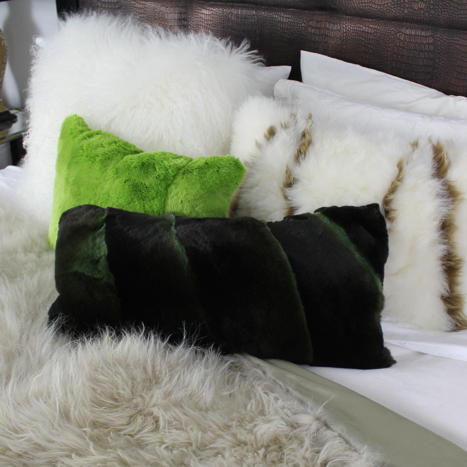 Add a layer of luxe texture to your living room or bedroom decor with this exquisite rabbit fur pillow designed by Emily Barbara. Its unique diagonal design offers a contemporary flavour paired with remarkable colouring and stylish comfort.