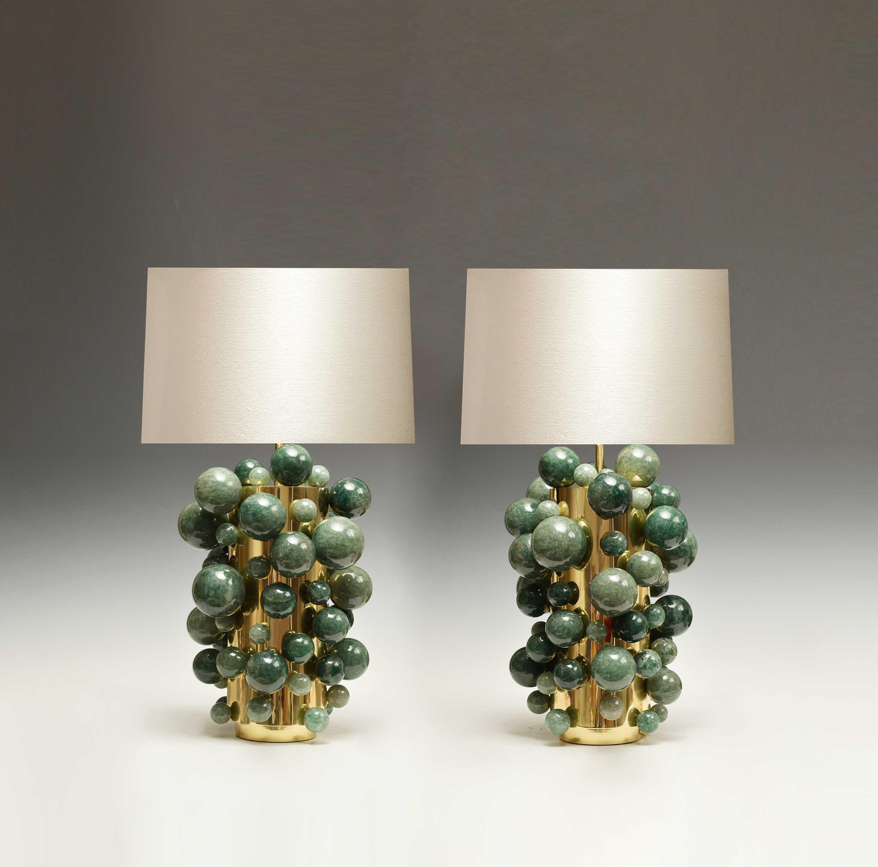 Pair of luxury green rock crystal quartz bubble lamps with polished brass frames. Created by Phoenix Gallery, NYC.
Each lamp installed two sockets.
To the top of the rock crystal 17 inch.
Lampshade not included.