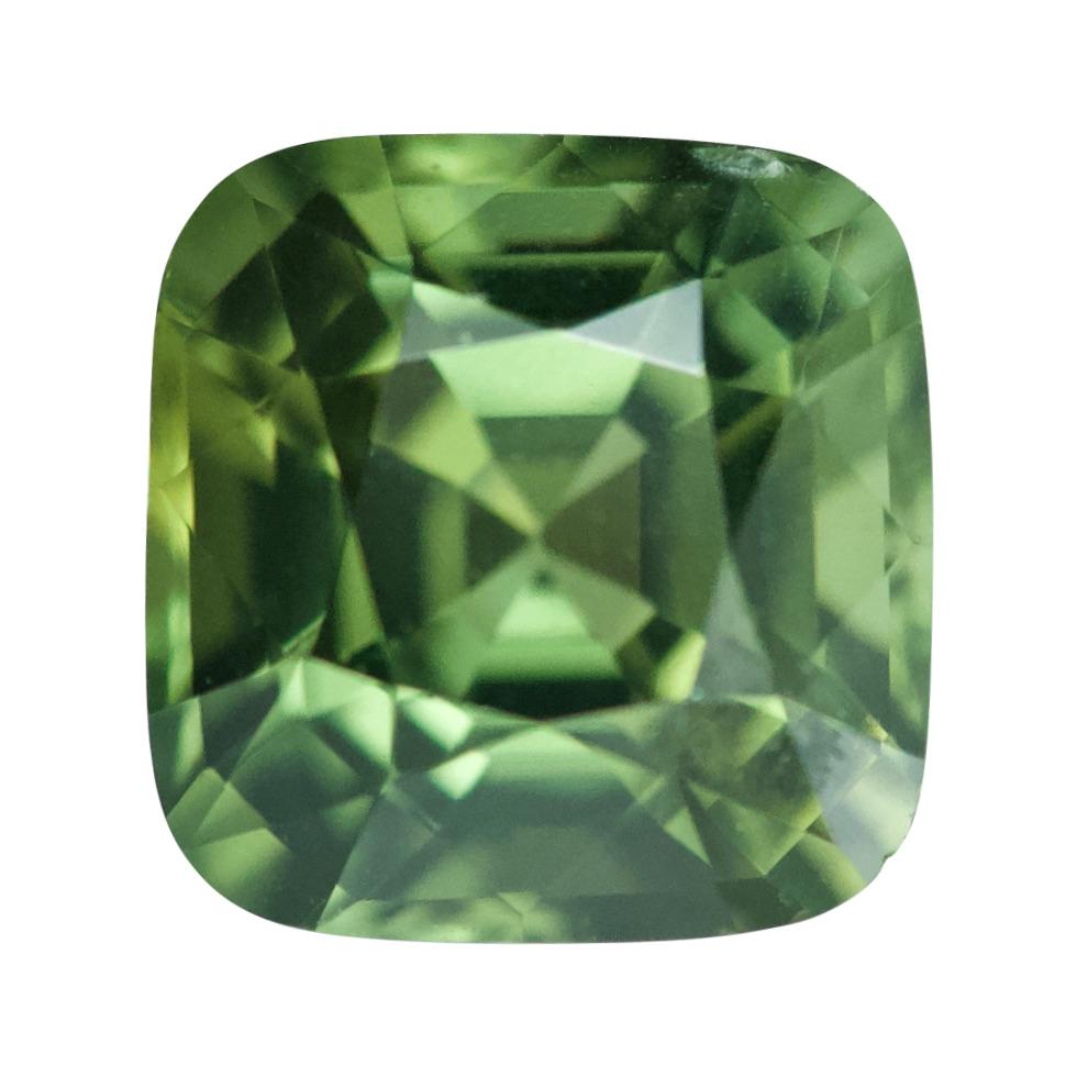 This shimmering natural Madagascan green sapphire displaying verdant shades of green from its hand cut facets. A skilfully cushion shaped gem of 2.54 carat with pristine clarity is a beauty to behold and custom made will make a statement jewellery