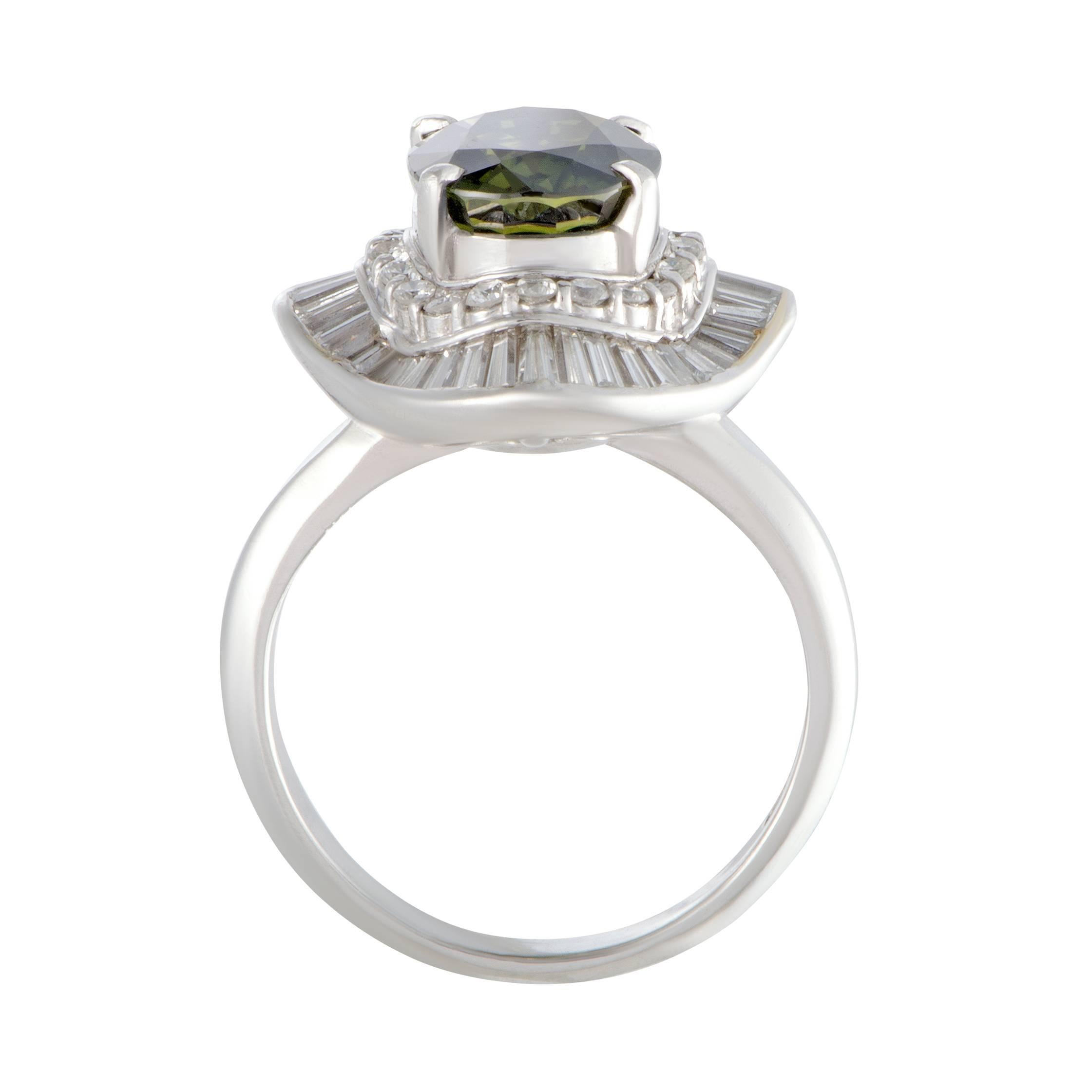 Designed in a splendidly classy manner and luxuriously decorated with spellbinding gems, this gorgeous ring boasts an endearingly elegant appeal. The ring is made of platinum and set with a green sapphire that weighs 4.21 carats, its captivating