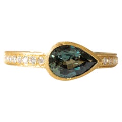 Green Sapphire Bezel Ring with Diamonds in 18K Yellow Gold