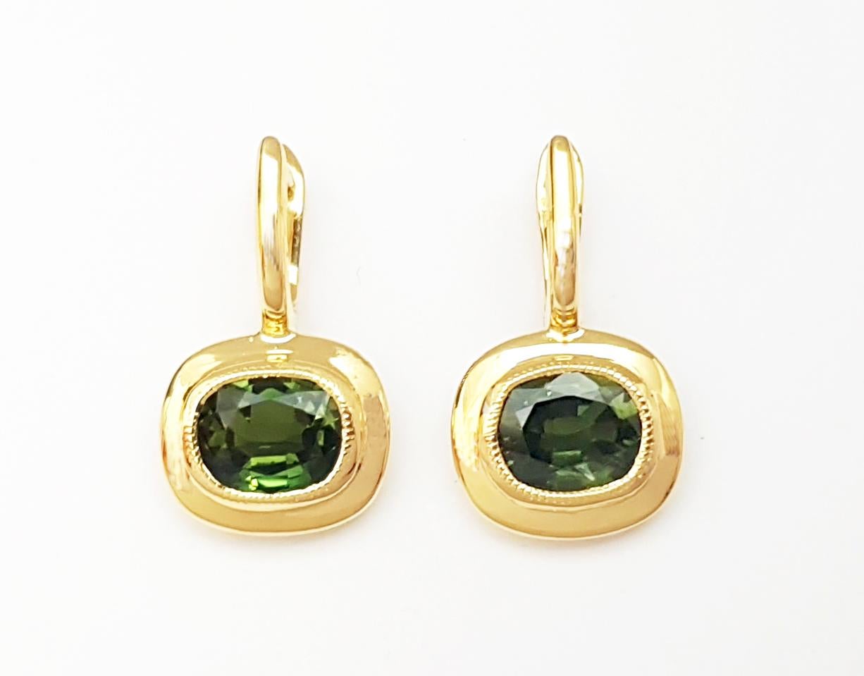 Contemporary Green Sapphire Earrings set in 18K Gold Settings For Sale