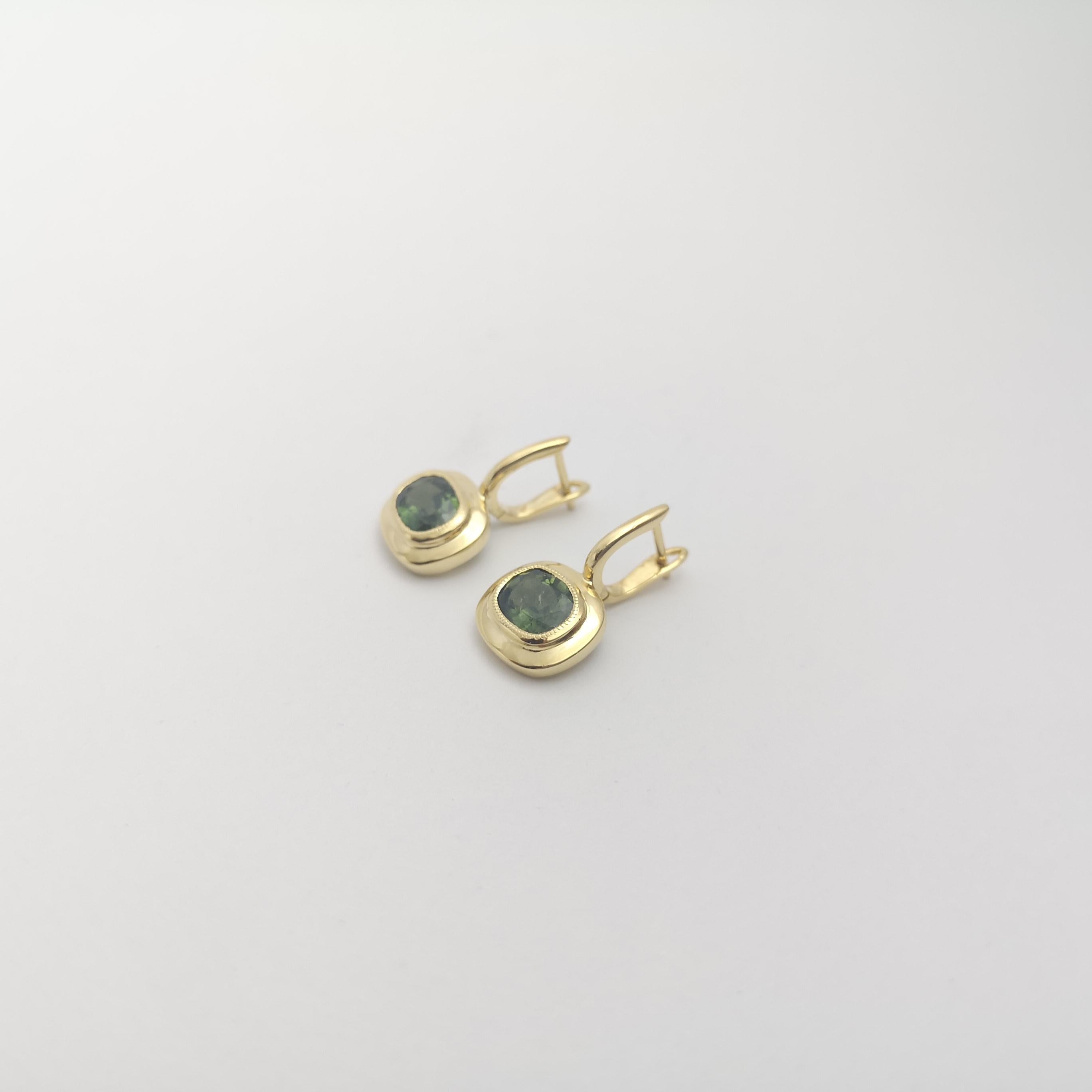 Women's Green Sapphire Earrings set in 18K Gold Settings For Sale