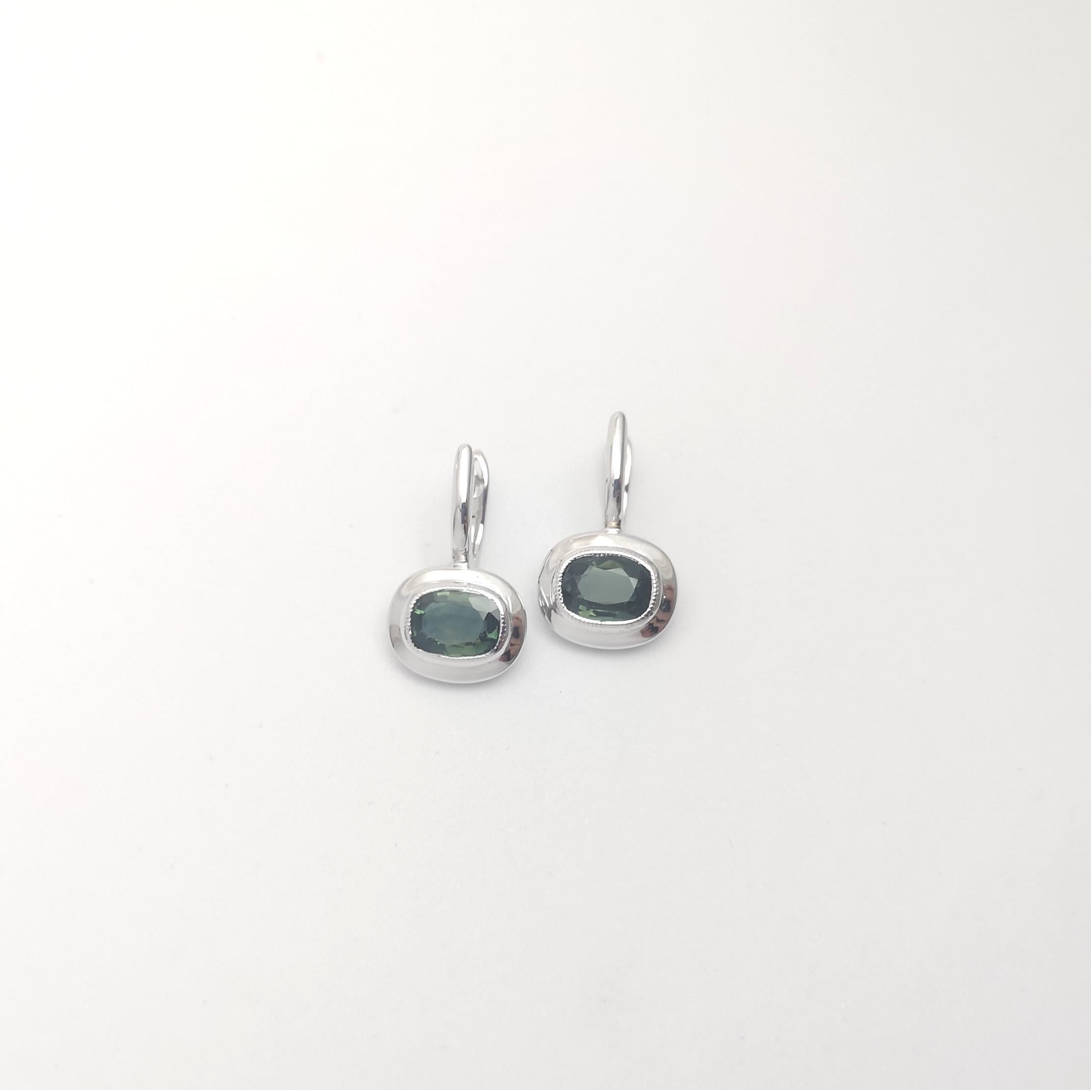 Women's Green Sapphire Earrings set in 18K White Gold Settings For Sale