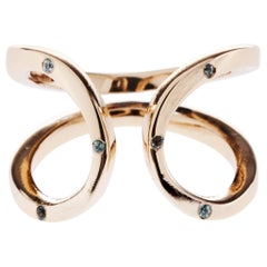 Verstellbarer Love-Ring aus Bronze mit grünem Saphir, offen, Unendlichkeit J Dauphin