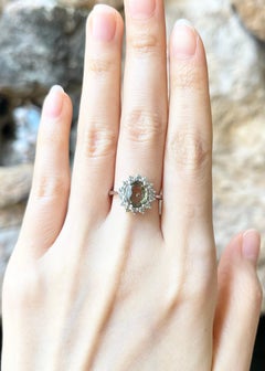 Green Sapphire Ring set in 14K White Gold Settings