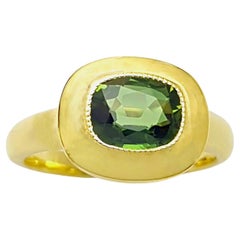 Green Sapphire Ring set in 18K Gold Settings